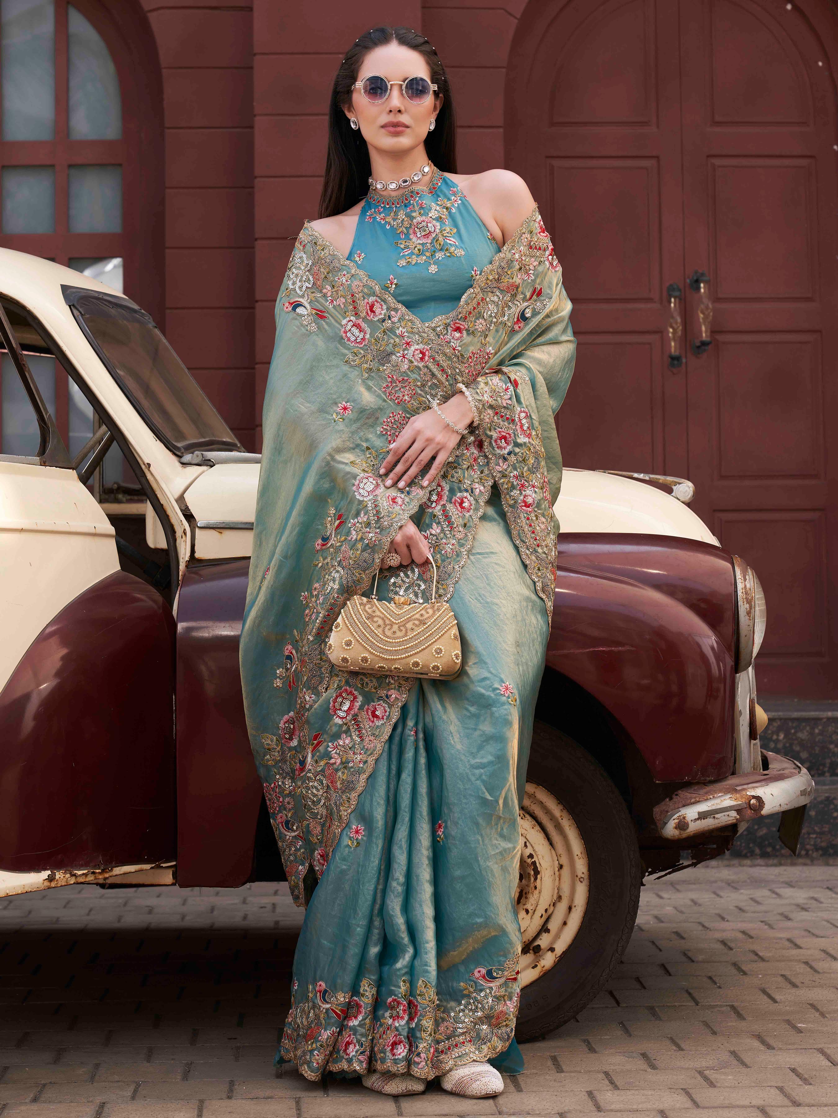 Two tone blue and gold colored jimmy choo saree with sequinned embroidery border