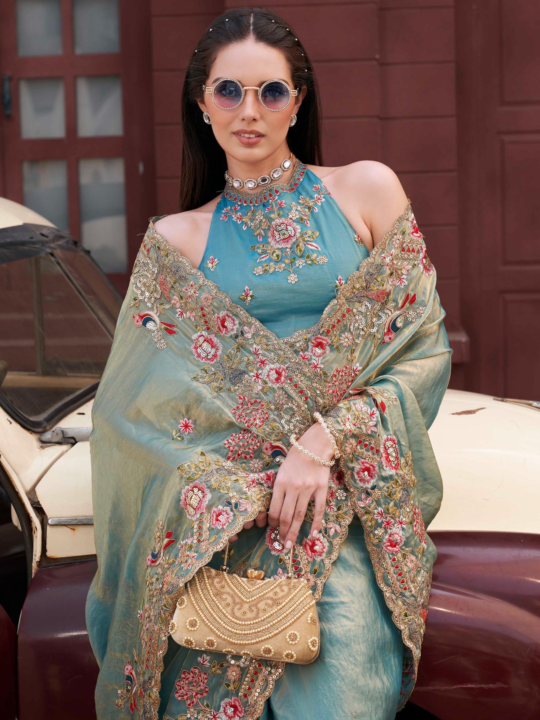 Two tone blue and gold colored jimmy choo saree with sequinned embroidery border