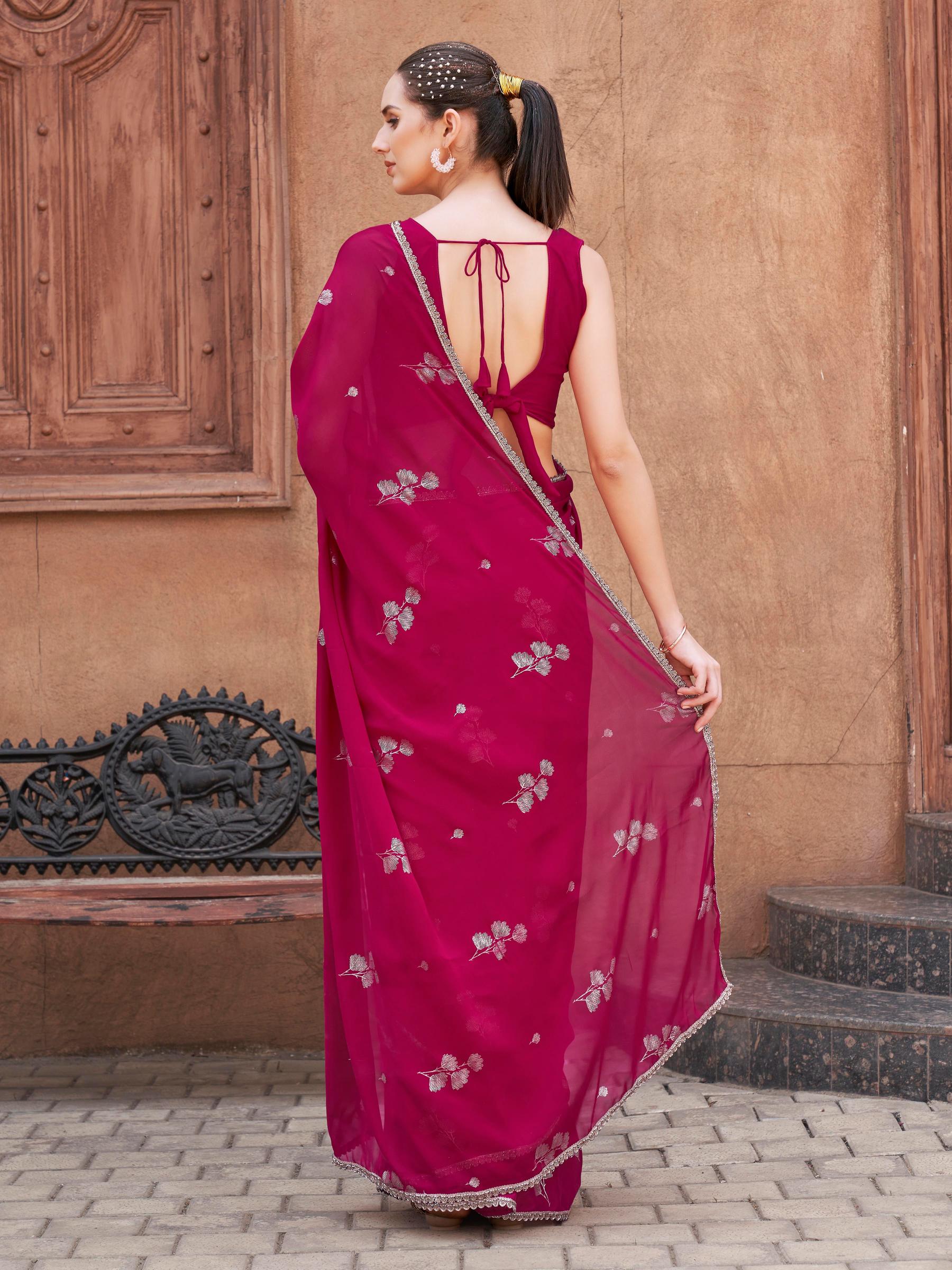 Pink colored designer saree with foil embellishment and embellished lace