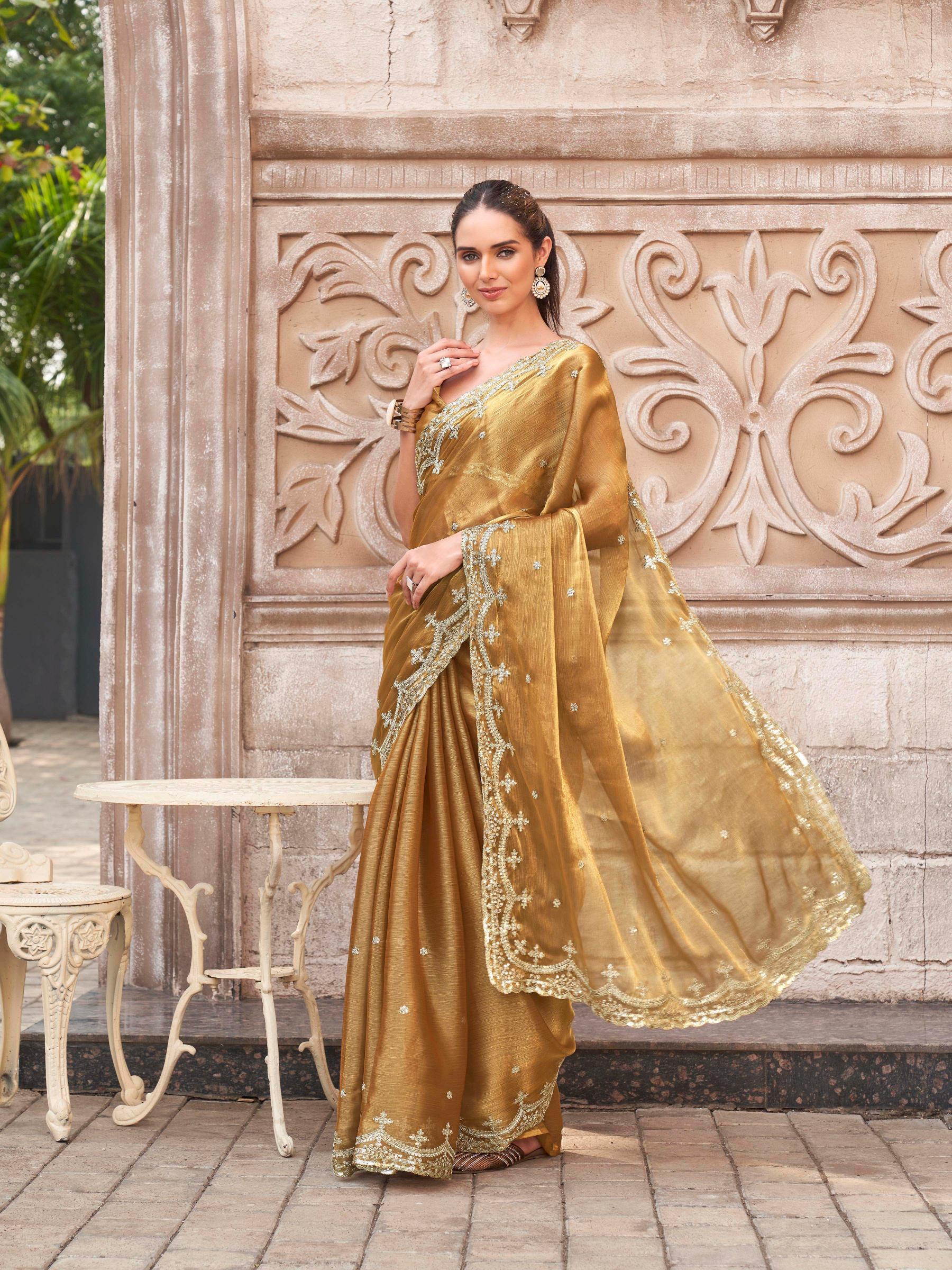 Gold colored jimmy chooo sequinned embroidered saree
