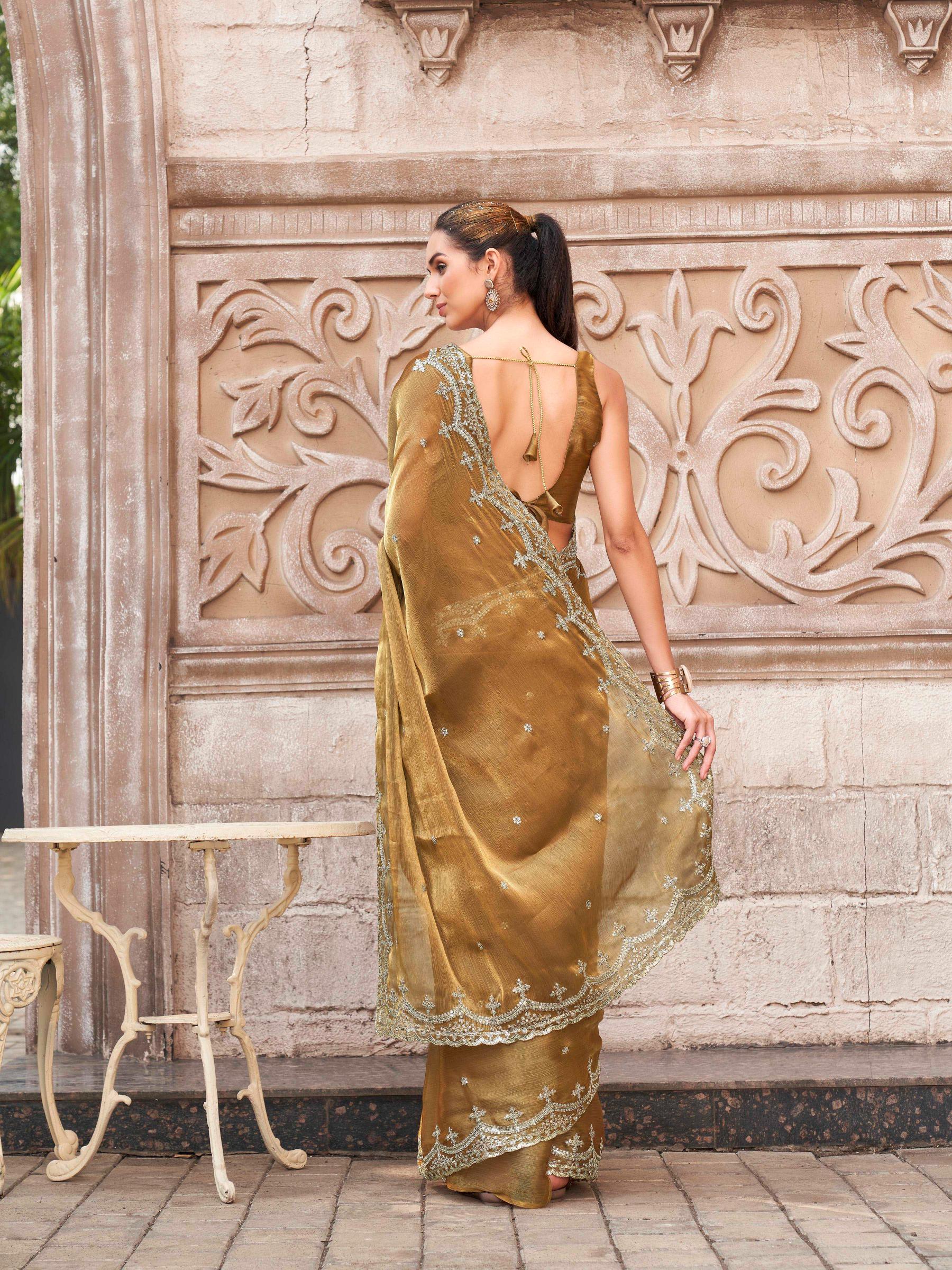 Gold colored jimmy chooo sequinned embroidered saree