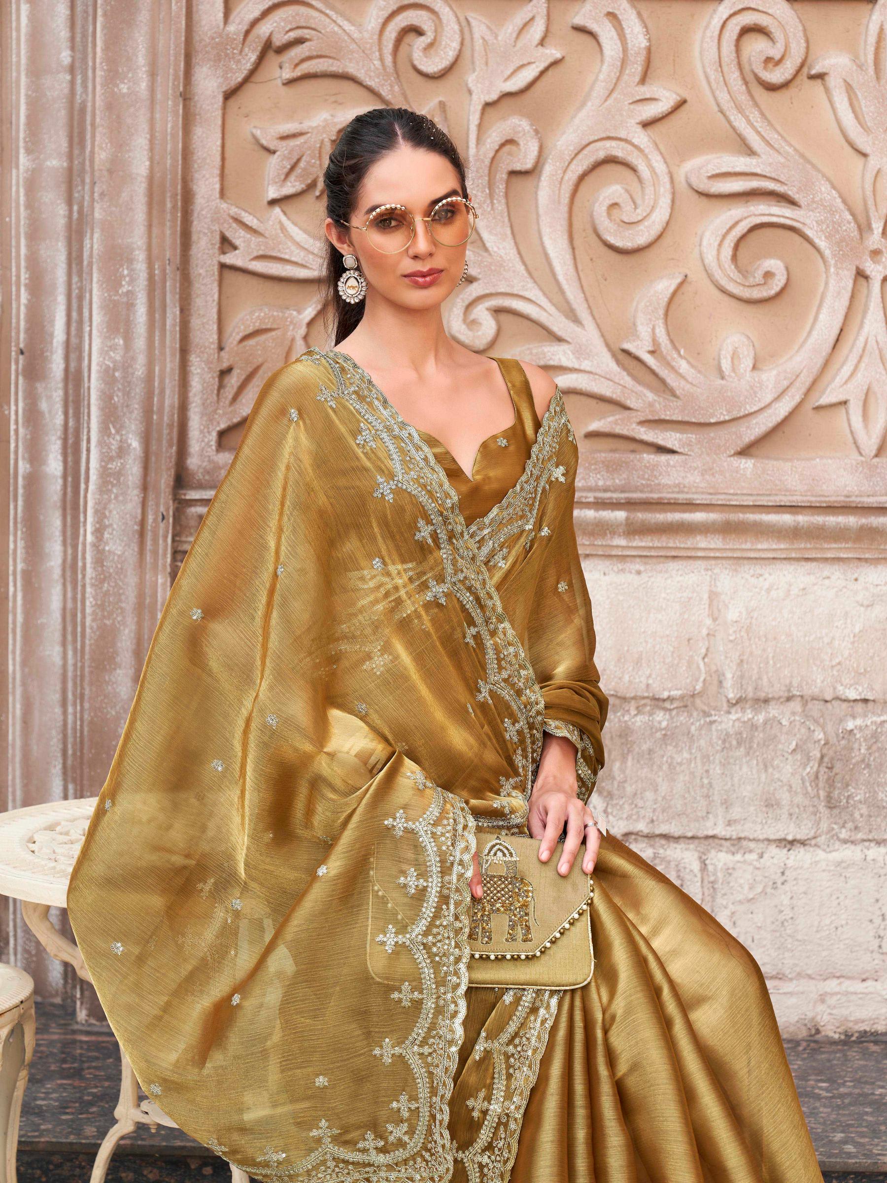 Gold colored jimmy chooo sequinned embroidered saree