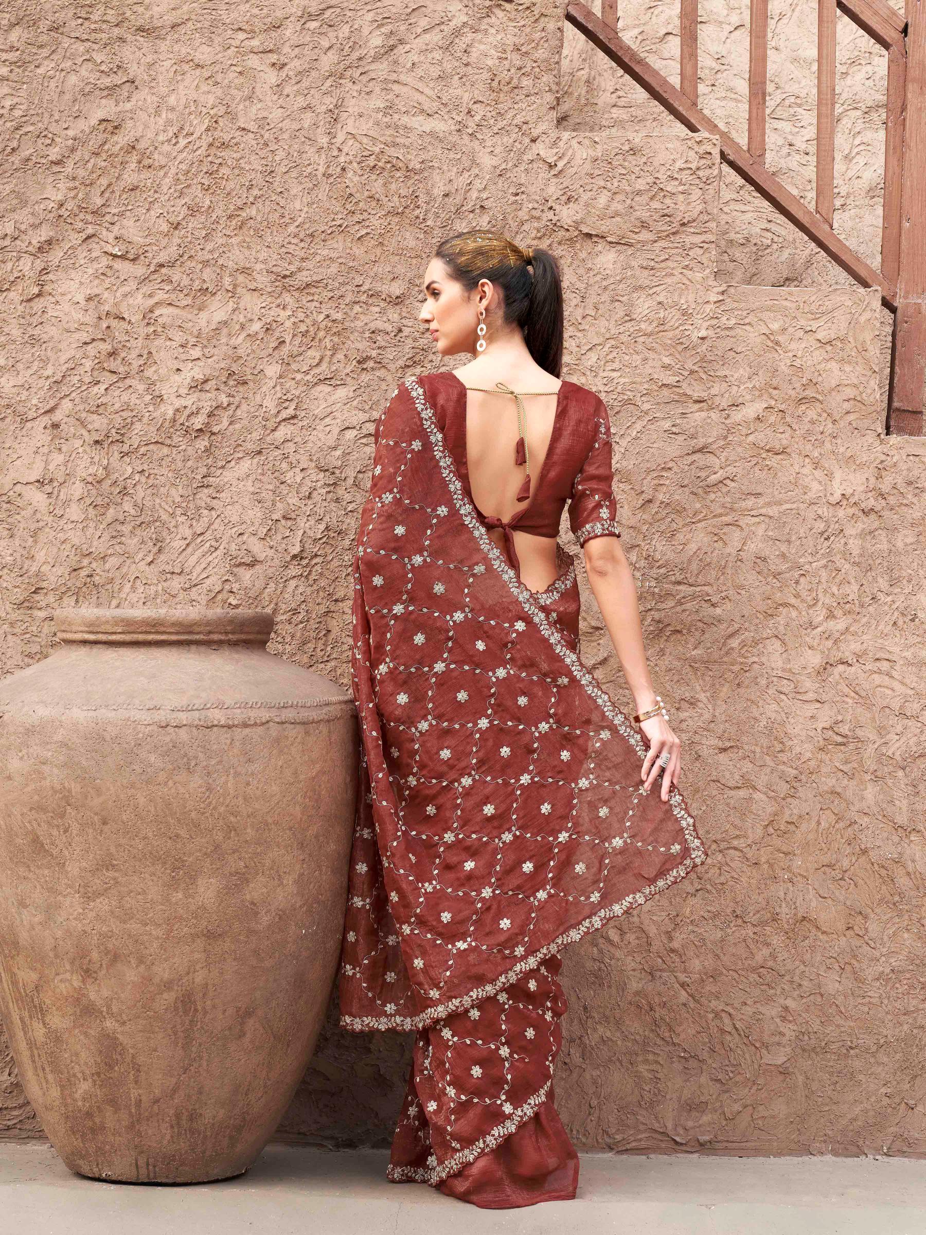 Rust colored crunchy saree with pitha embroidered work