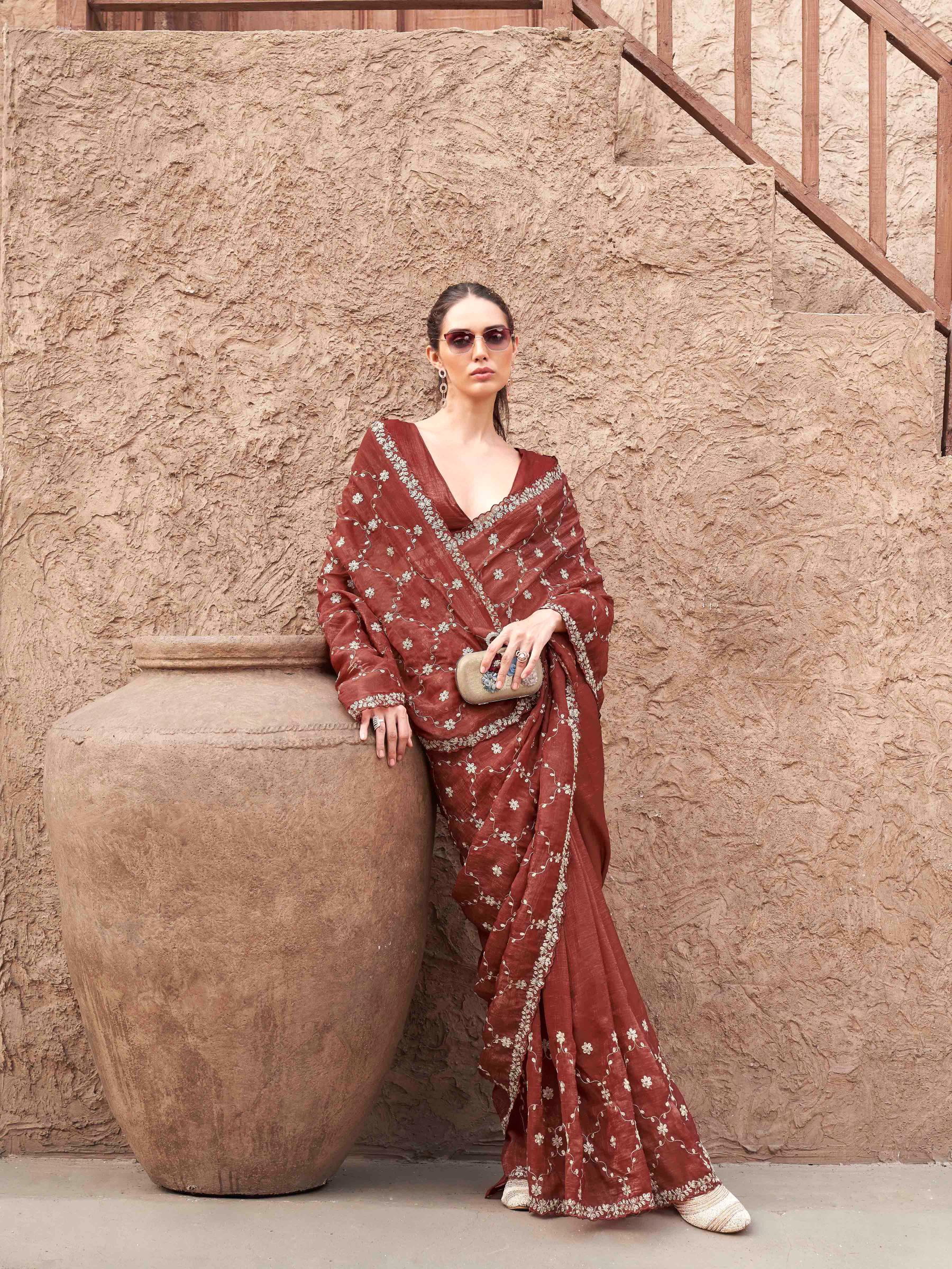 Rust colored crunchy saree with pitha embroidered work