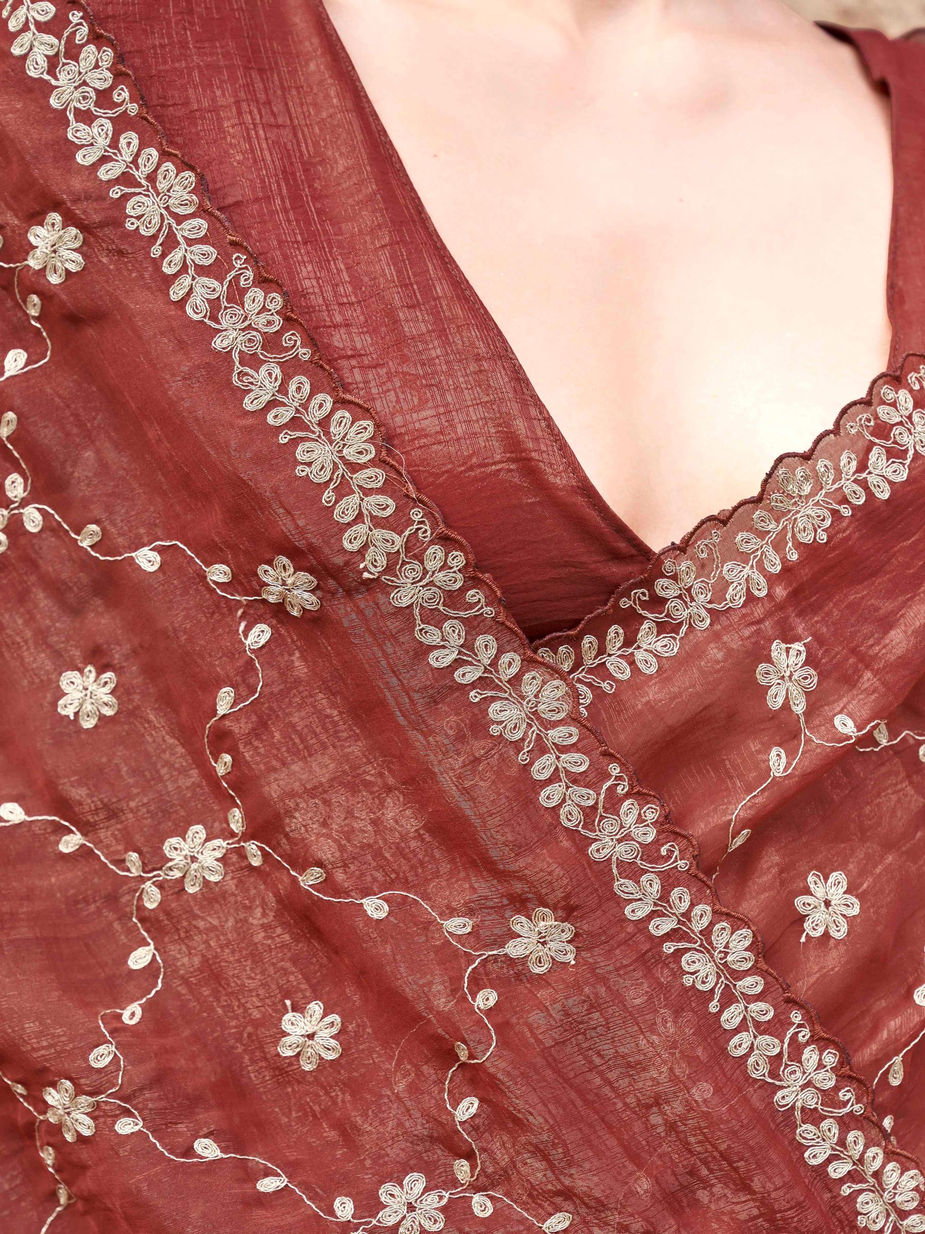 Rust colored crunchy saree with pitha embroidered work