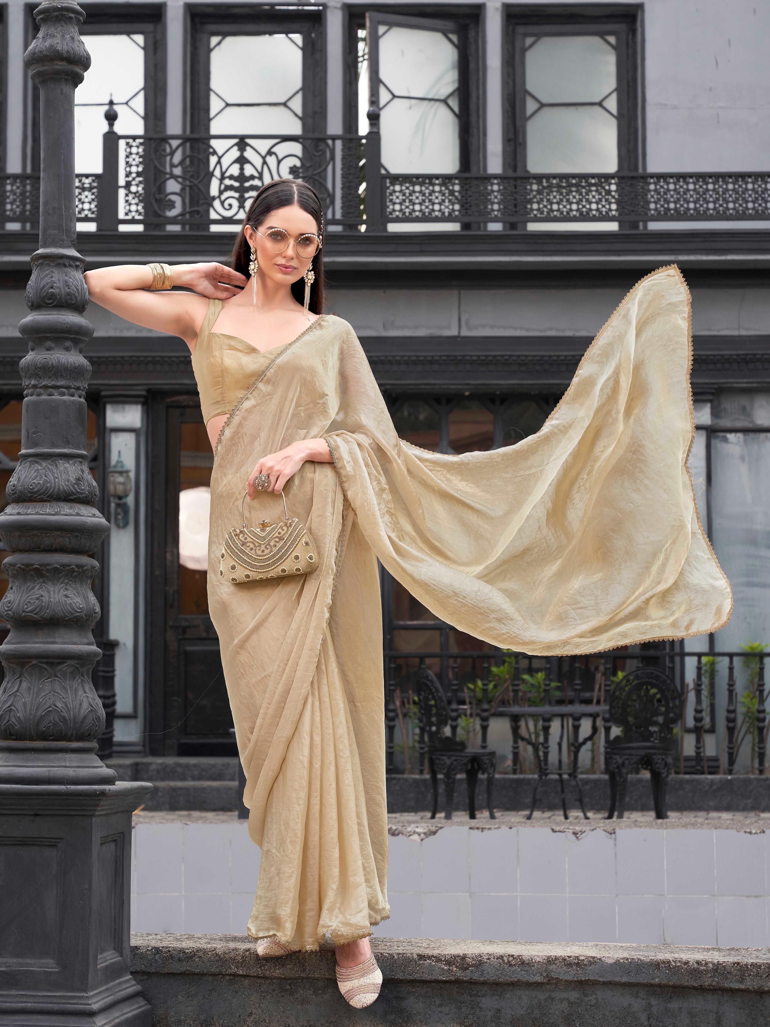 Ready to wear beige colored jimmy choo saree with embellished lace