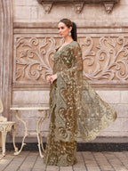 Brown colored embroidered net saree