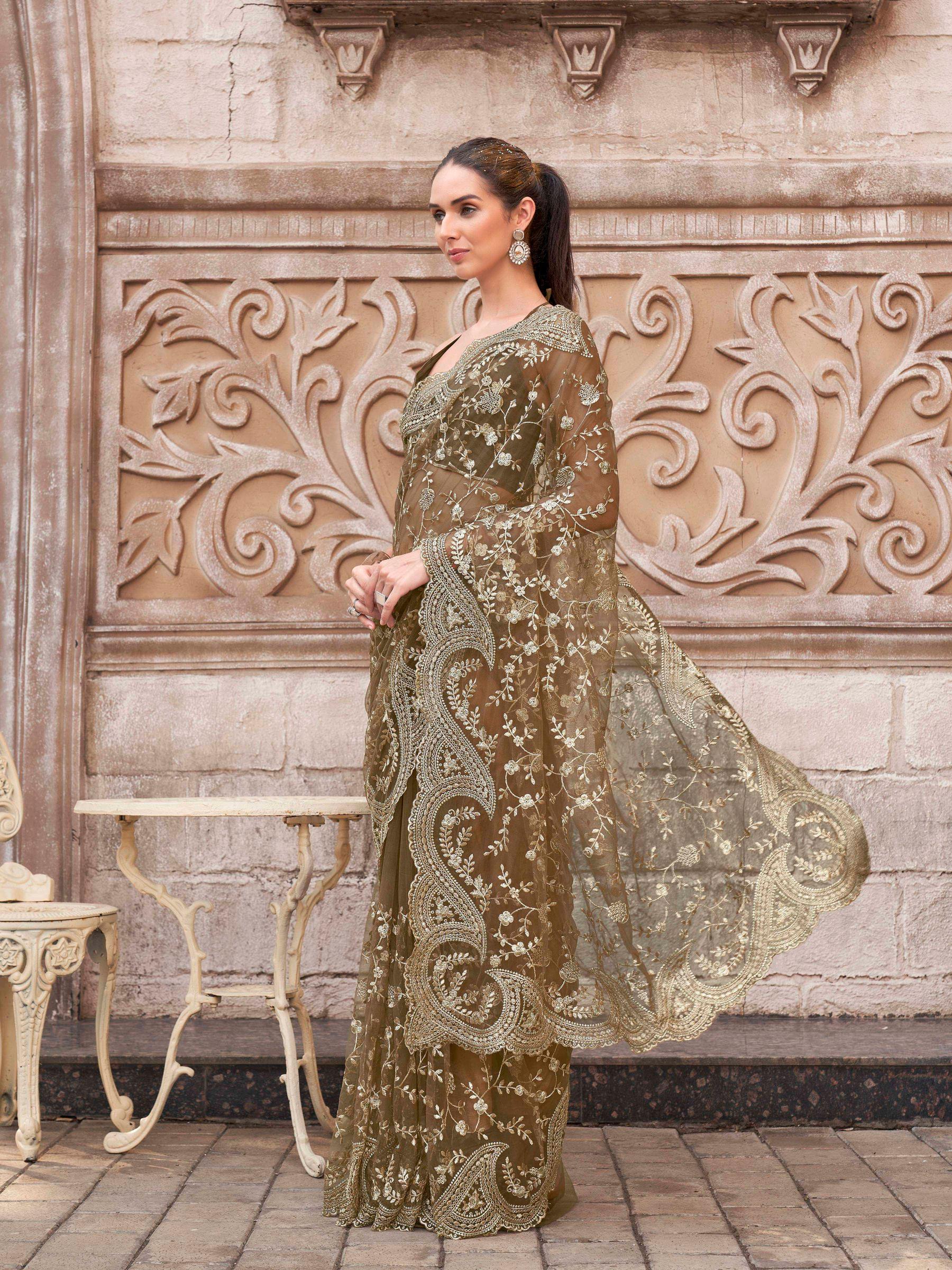 Brown colored embroidered net saree