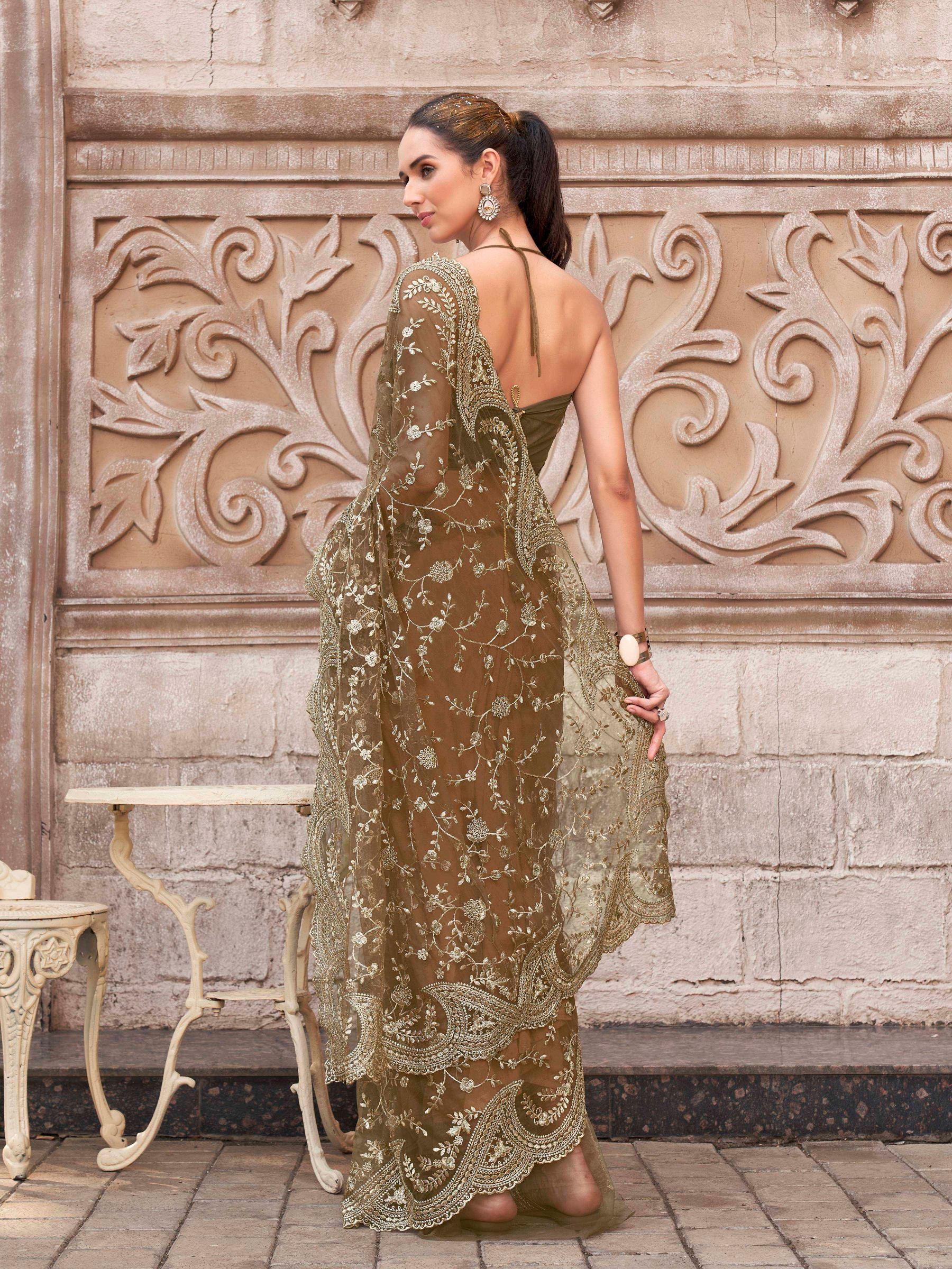 Brown colored embroidered net saree