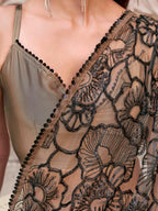 Brown colored designer saree with sequence and beads embroidery on shoulder portion