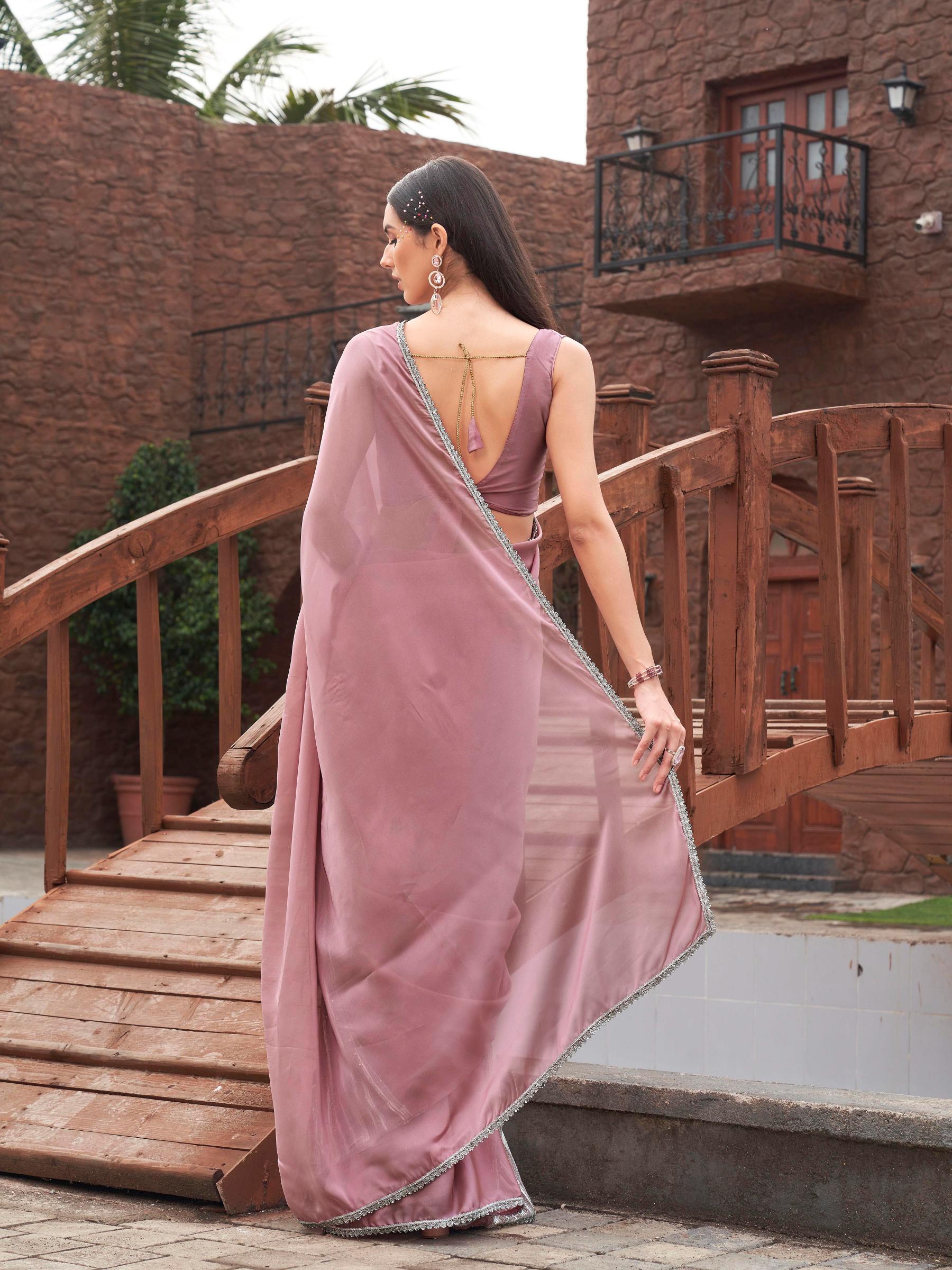 Pink colored designer half and half saree