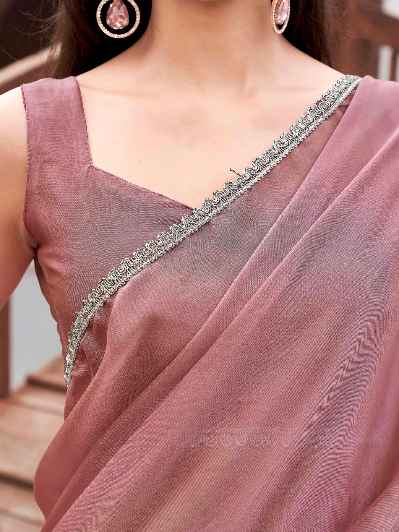 Pink colored designer half and half saree