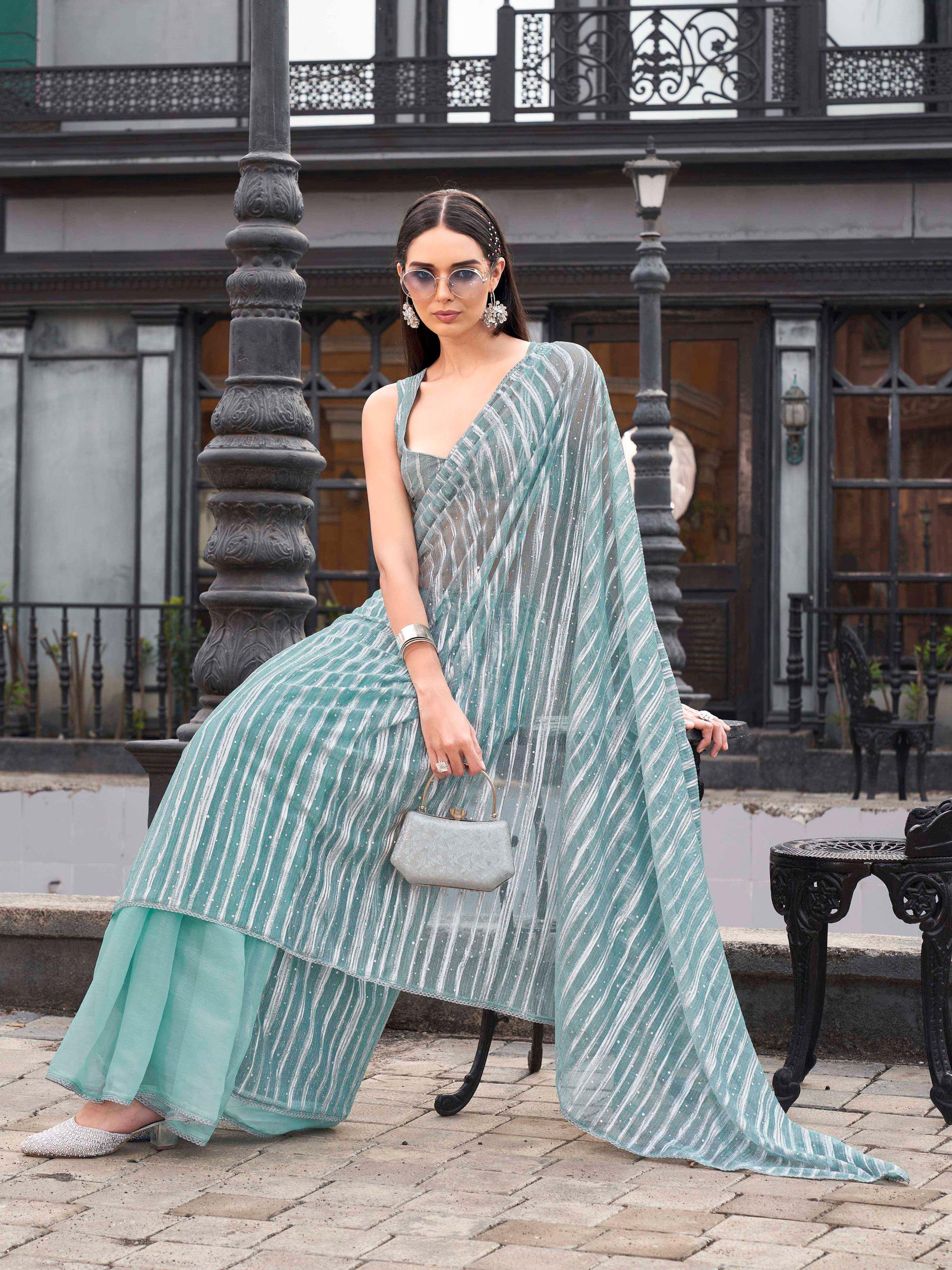 Blue colored designer satin half & half saree