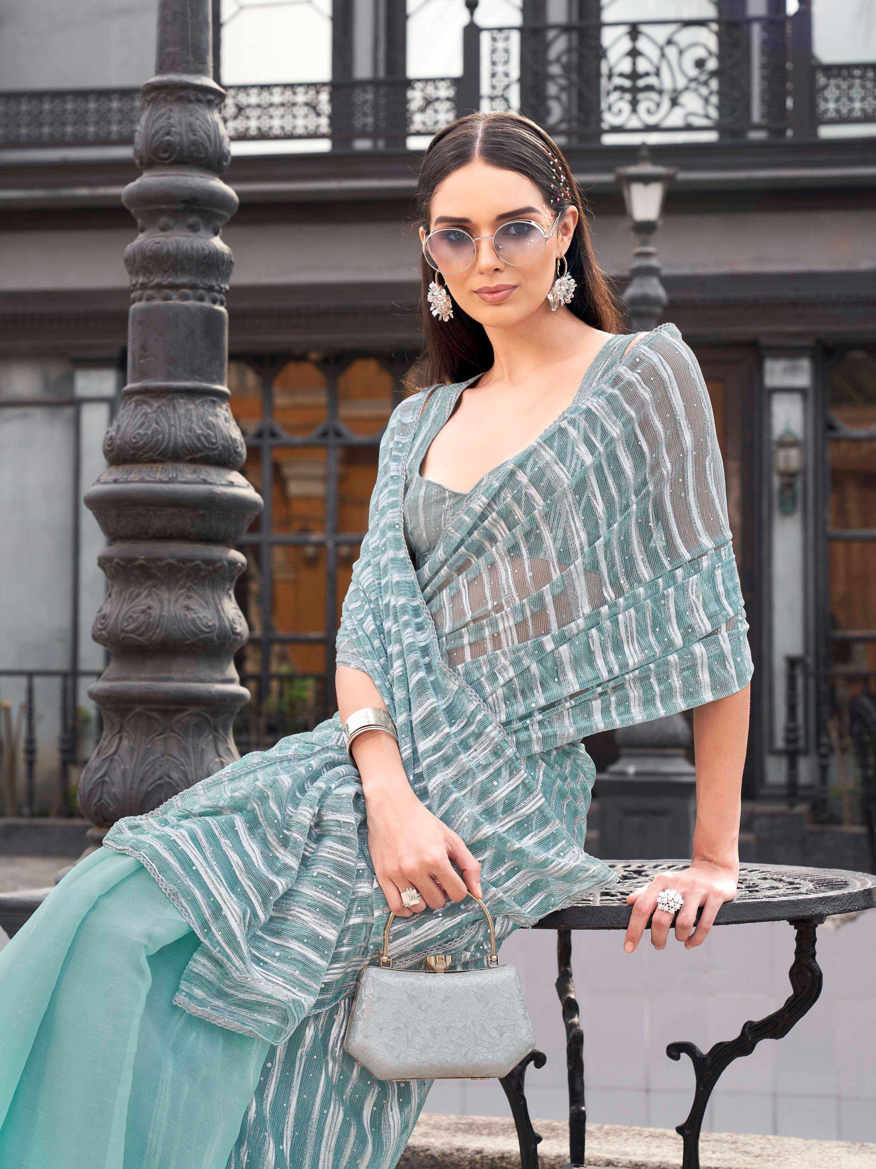 Blue colored designer satin half & half saree