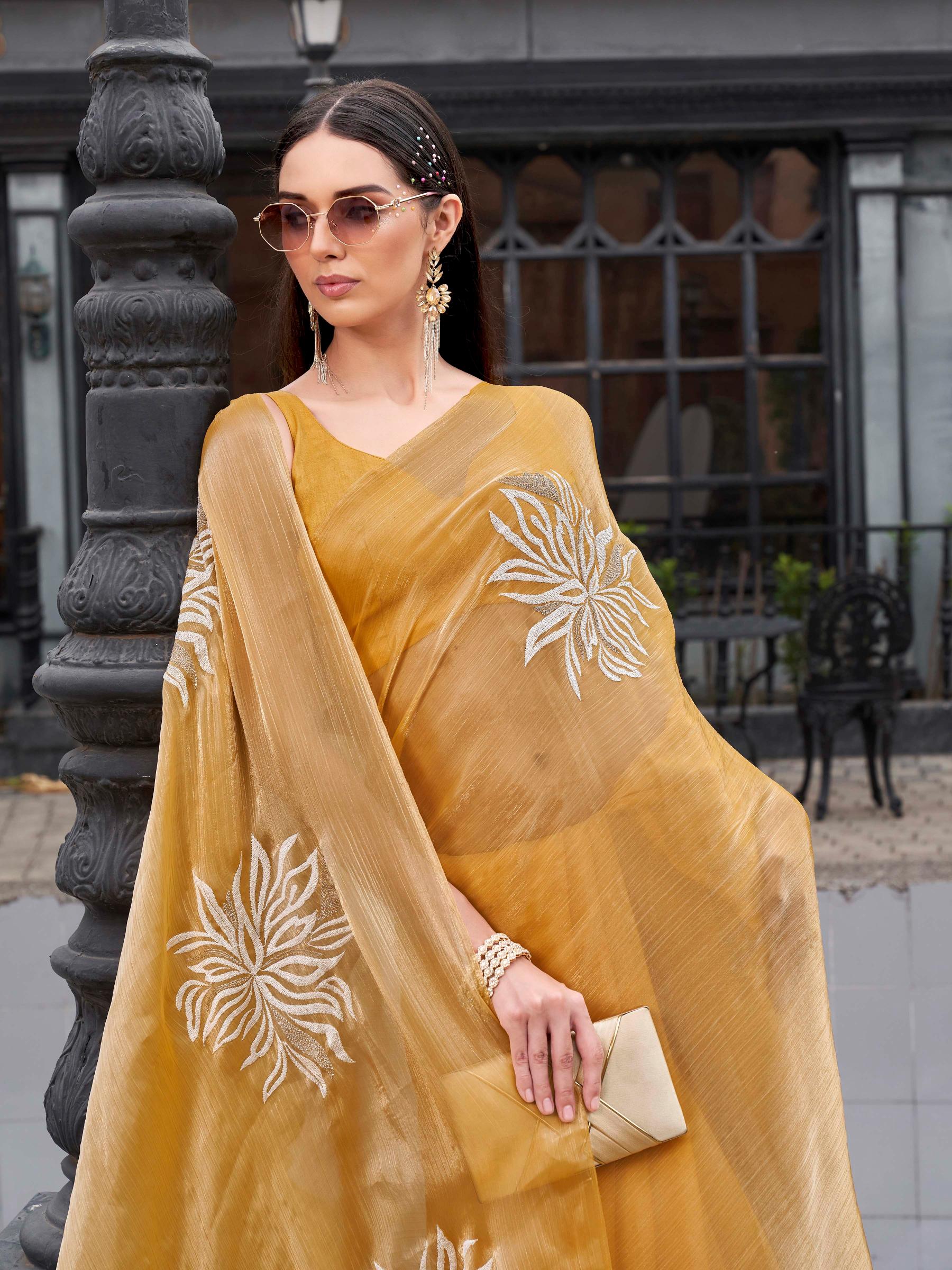 Yellow colored embroidred designer saree