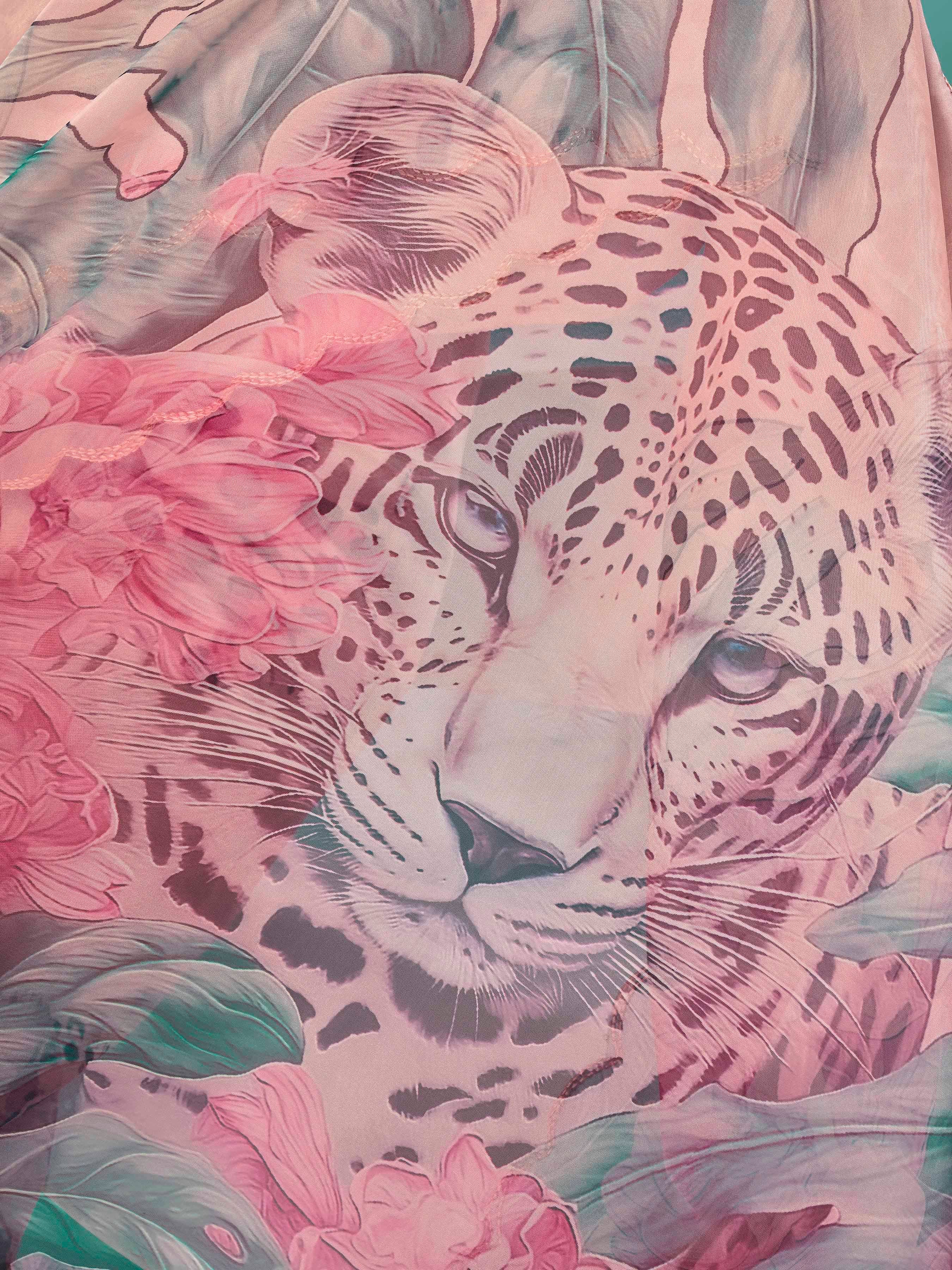 Peach colored designer animal print organza saree with scalloped border