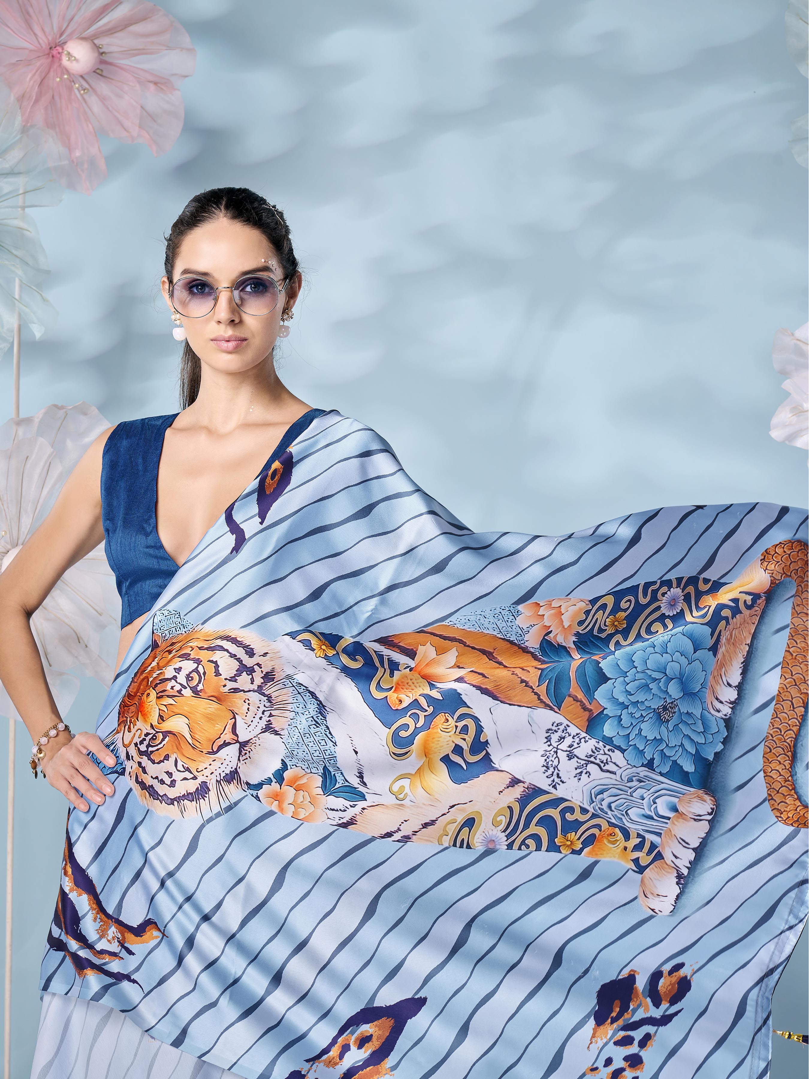 Blue colored designer animal print designer satin saree