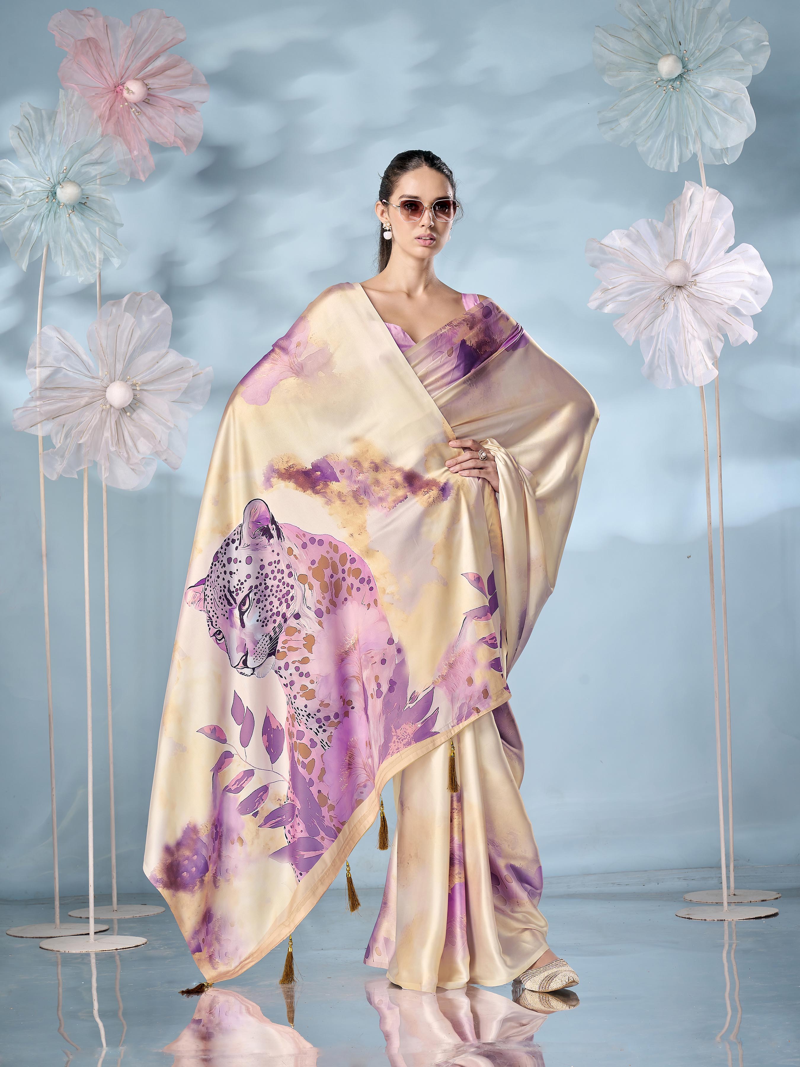 Cream colored designer animal print designer satin saree