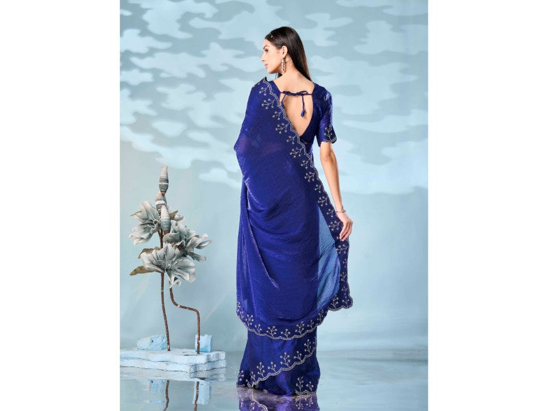 Royal blue colored satin saree with heavy work