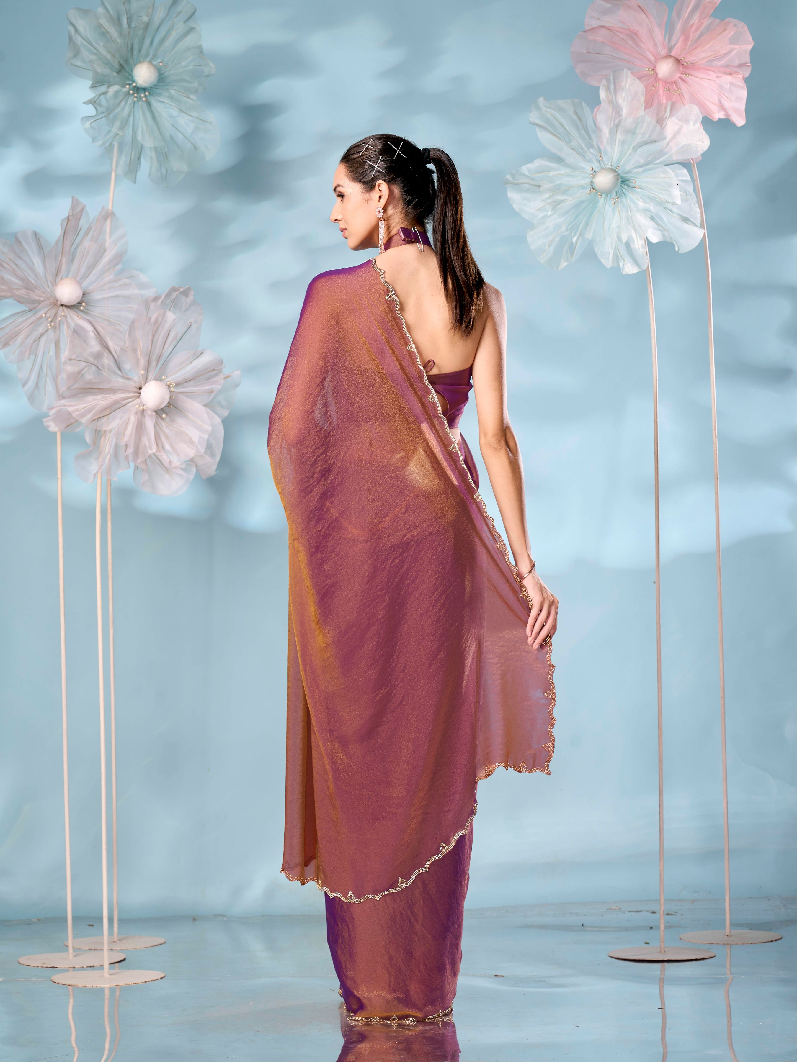 Two tone purple & gold colored satin saree with  swaroski border