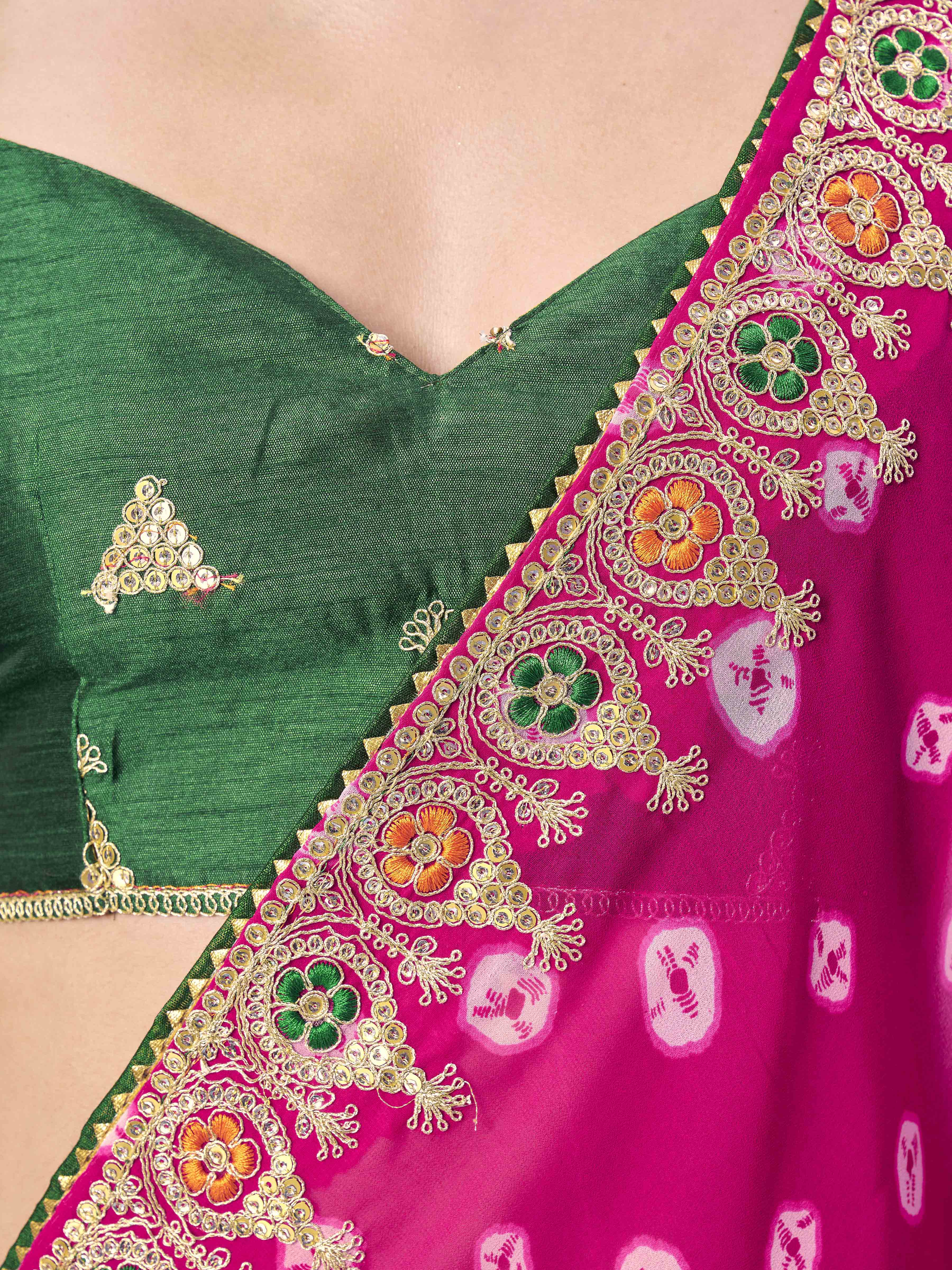 Rani colored bandhani printed embroidered saree