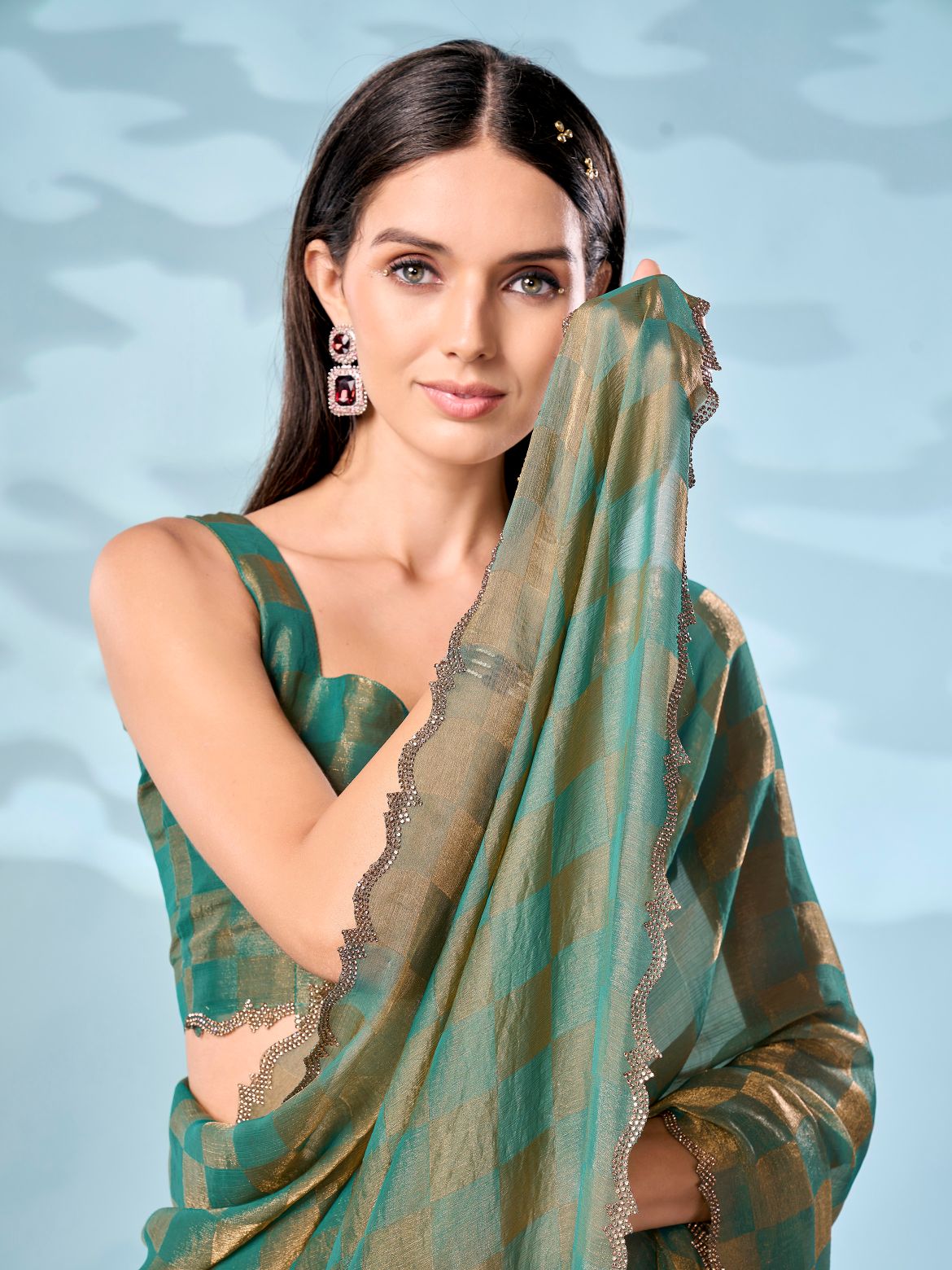 Checks pattern two tone green & golden colored designer saree with swaroski border