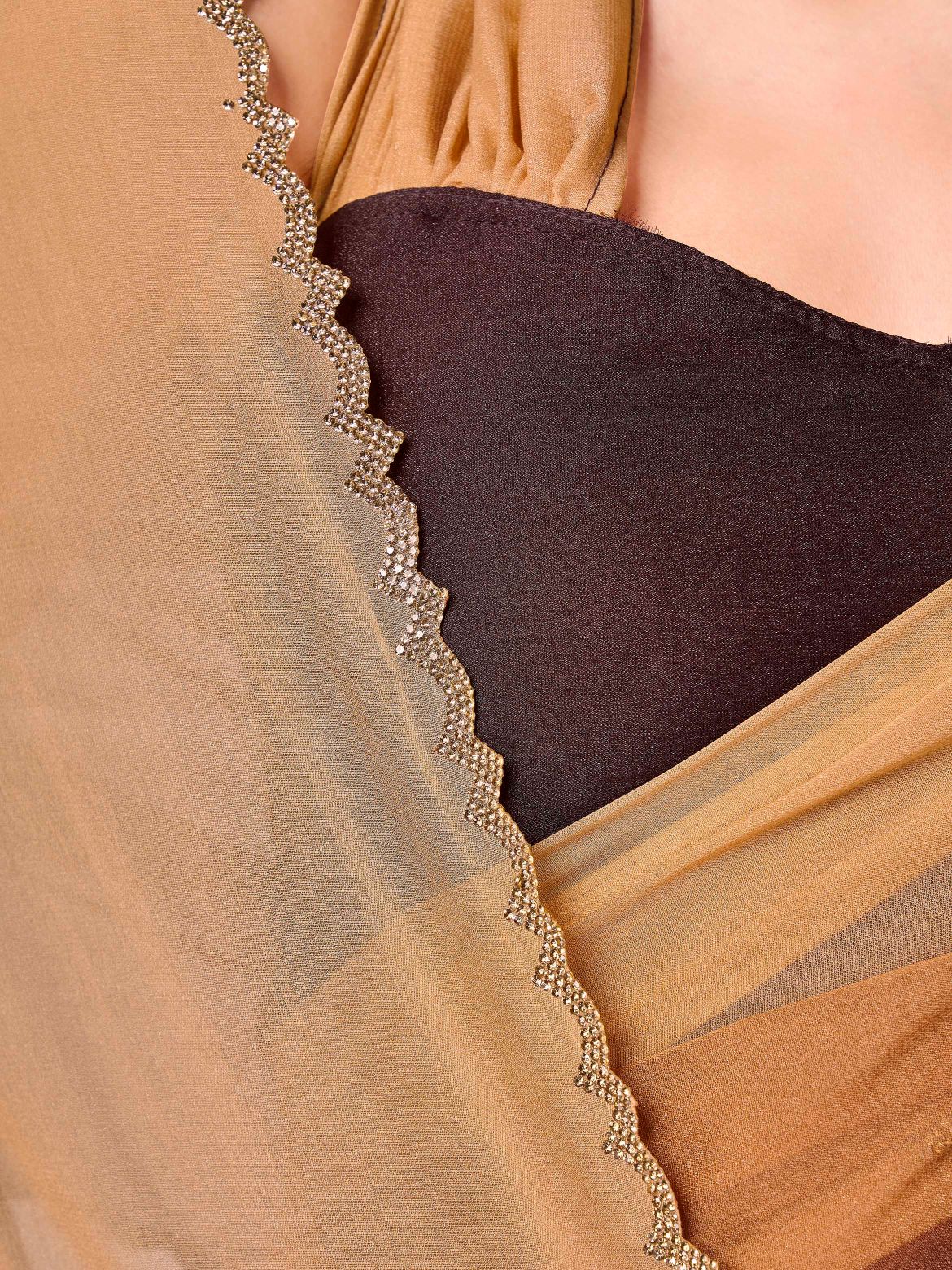 Ombre peach & brown colored designer saree with swaroski border