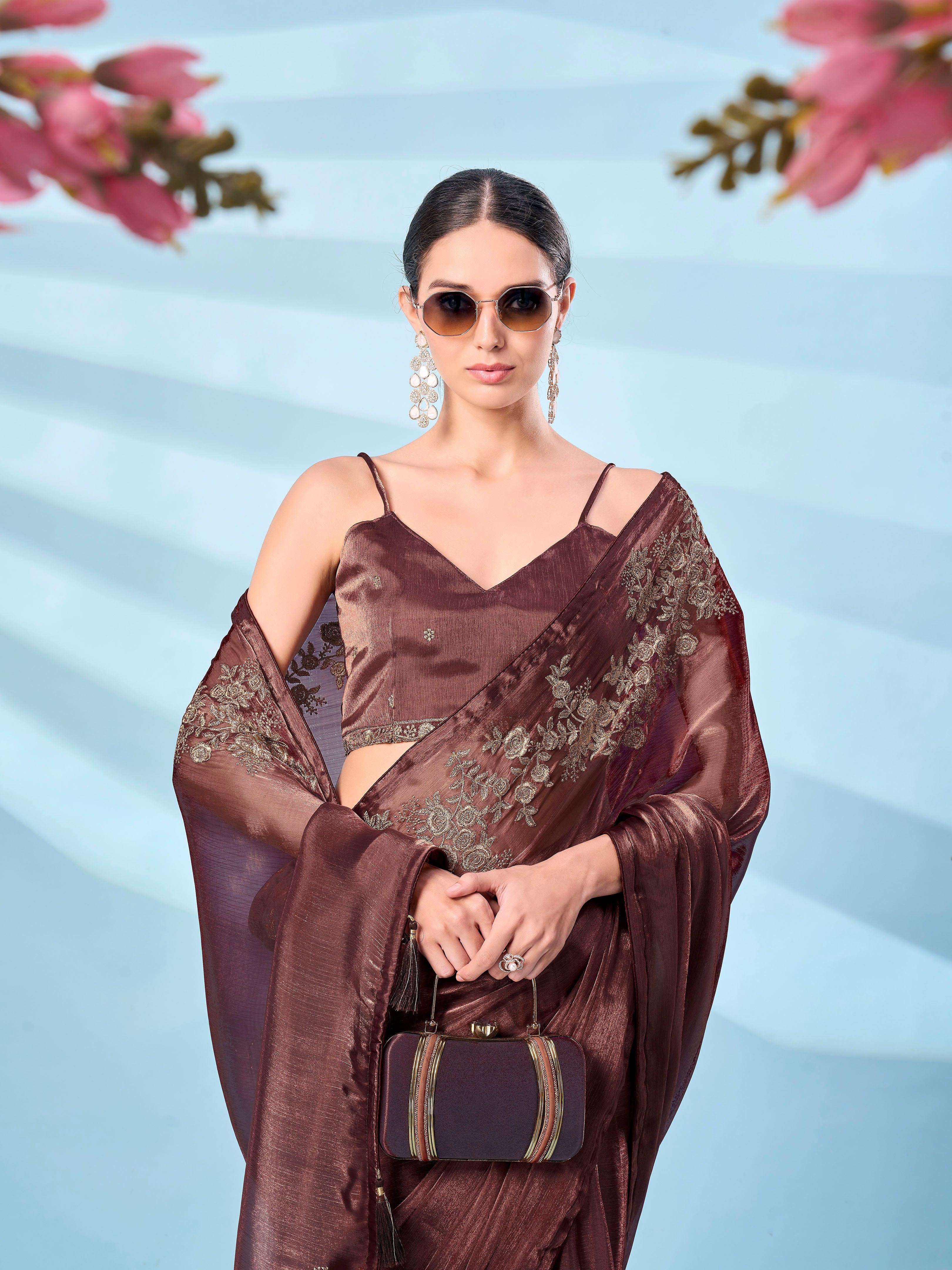 Metallic bronze colored zari embroidered saree with tassles on pallu