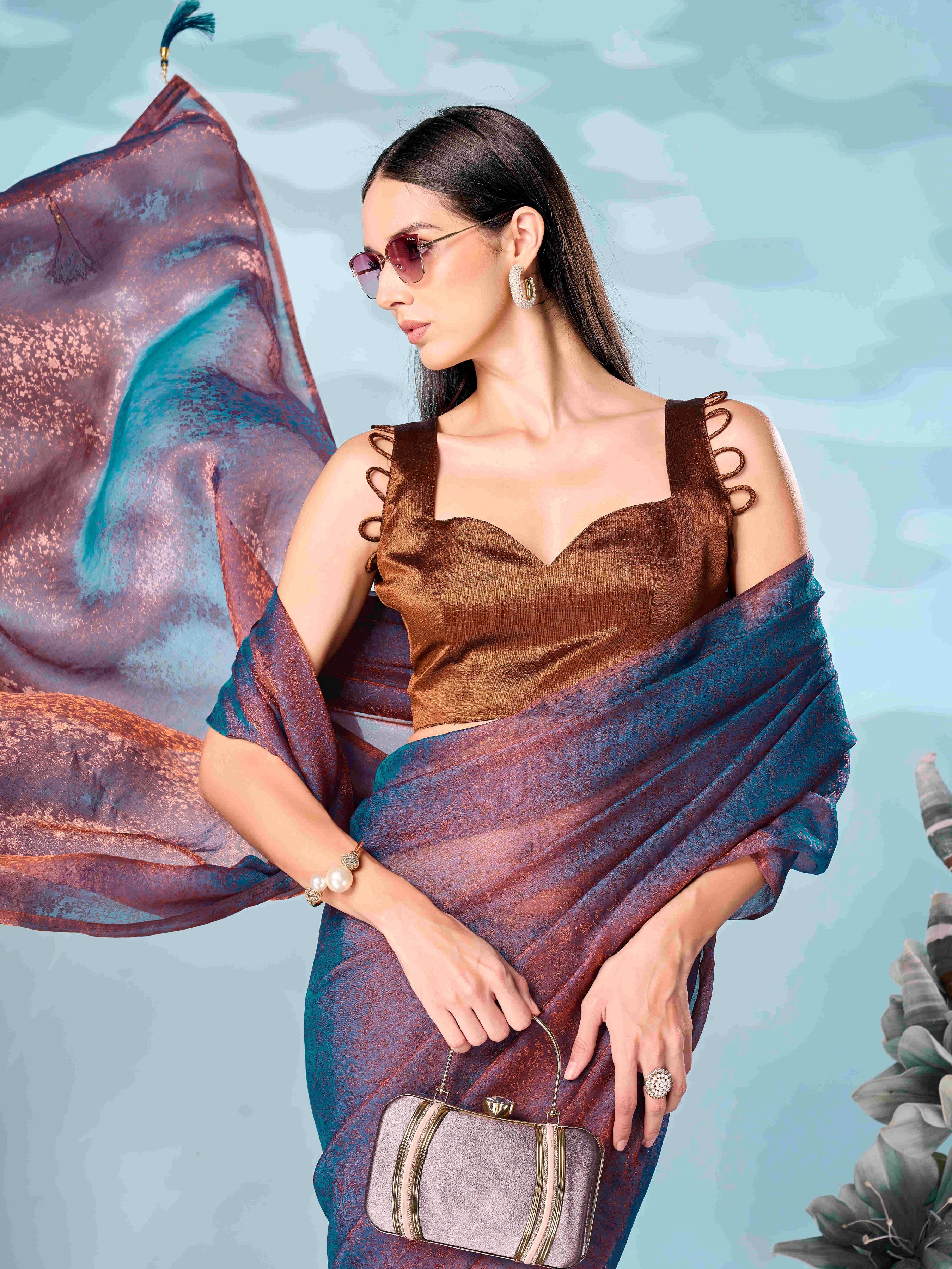 Two tone blue and bronze colored woven saree with tassles on pallu