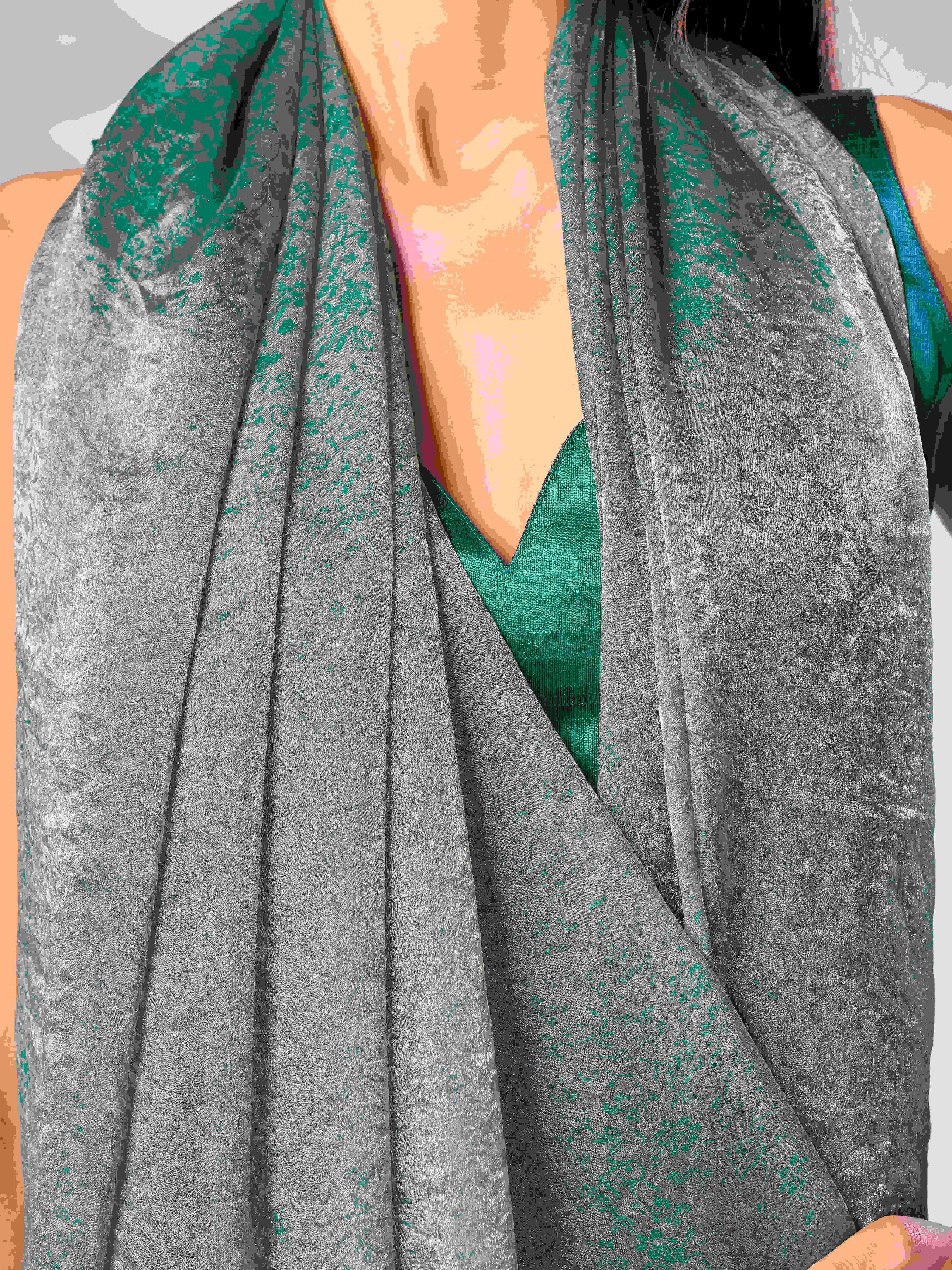 Two tone blue and gold colored woven saree with tassles on pallu