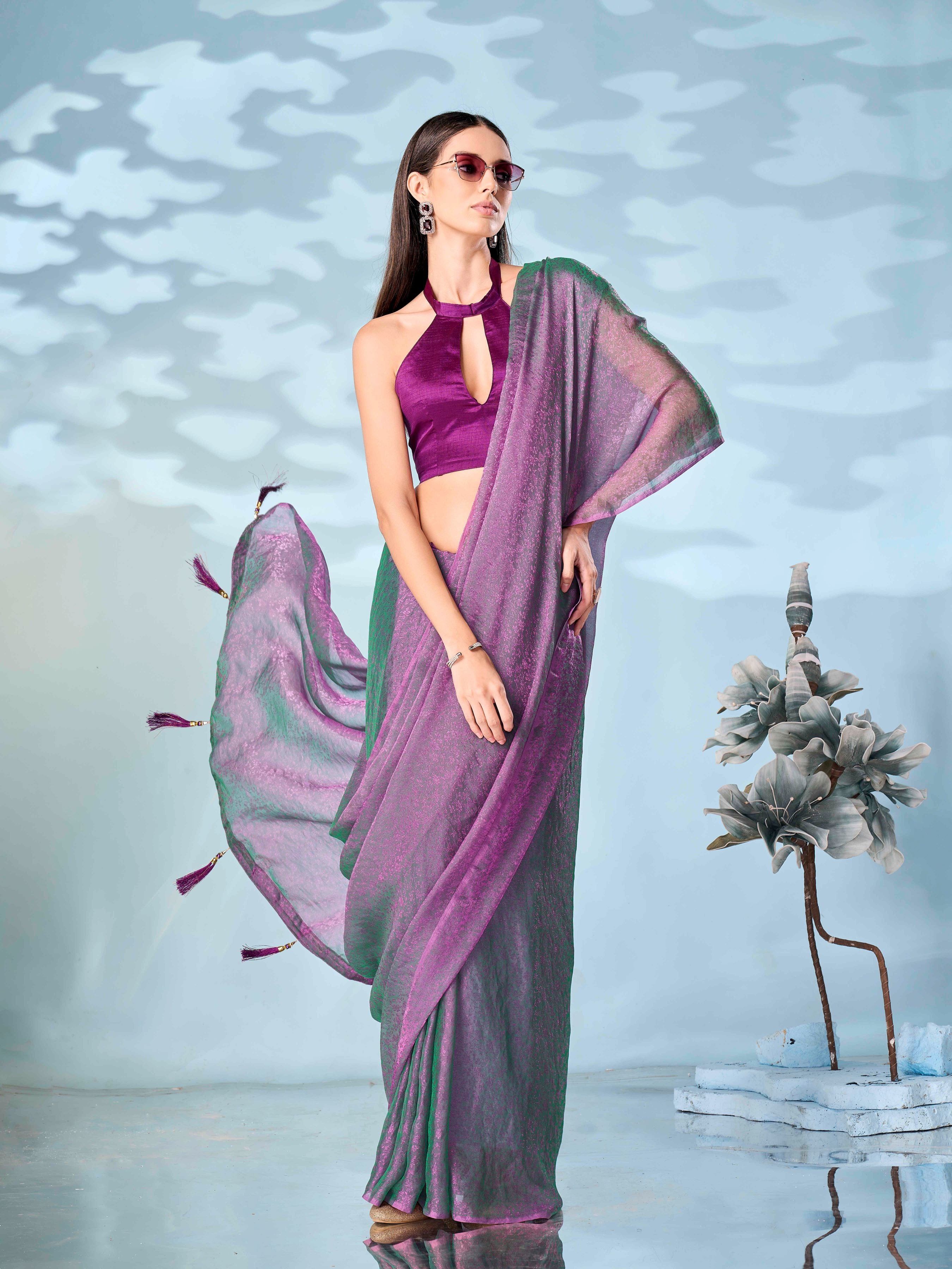 Two tone pink and green colored woven saree with tassles on pallu