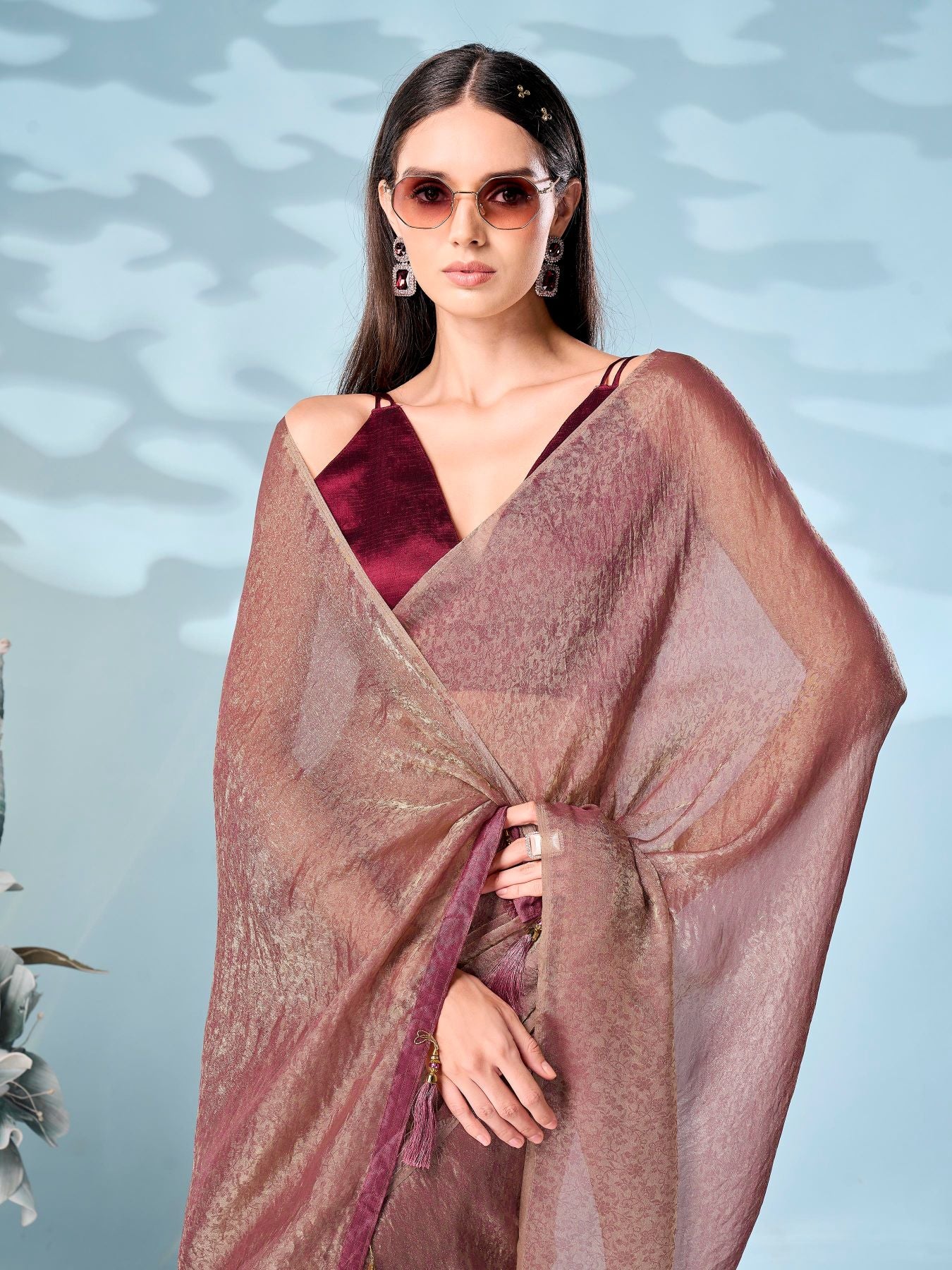 Two tone rose gold and dusty pink colored woven saree with tassles on pallu