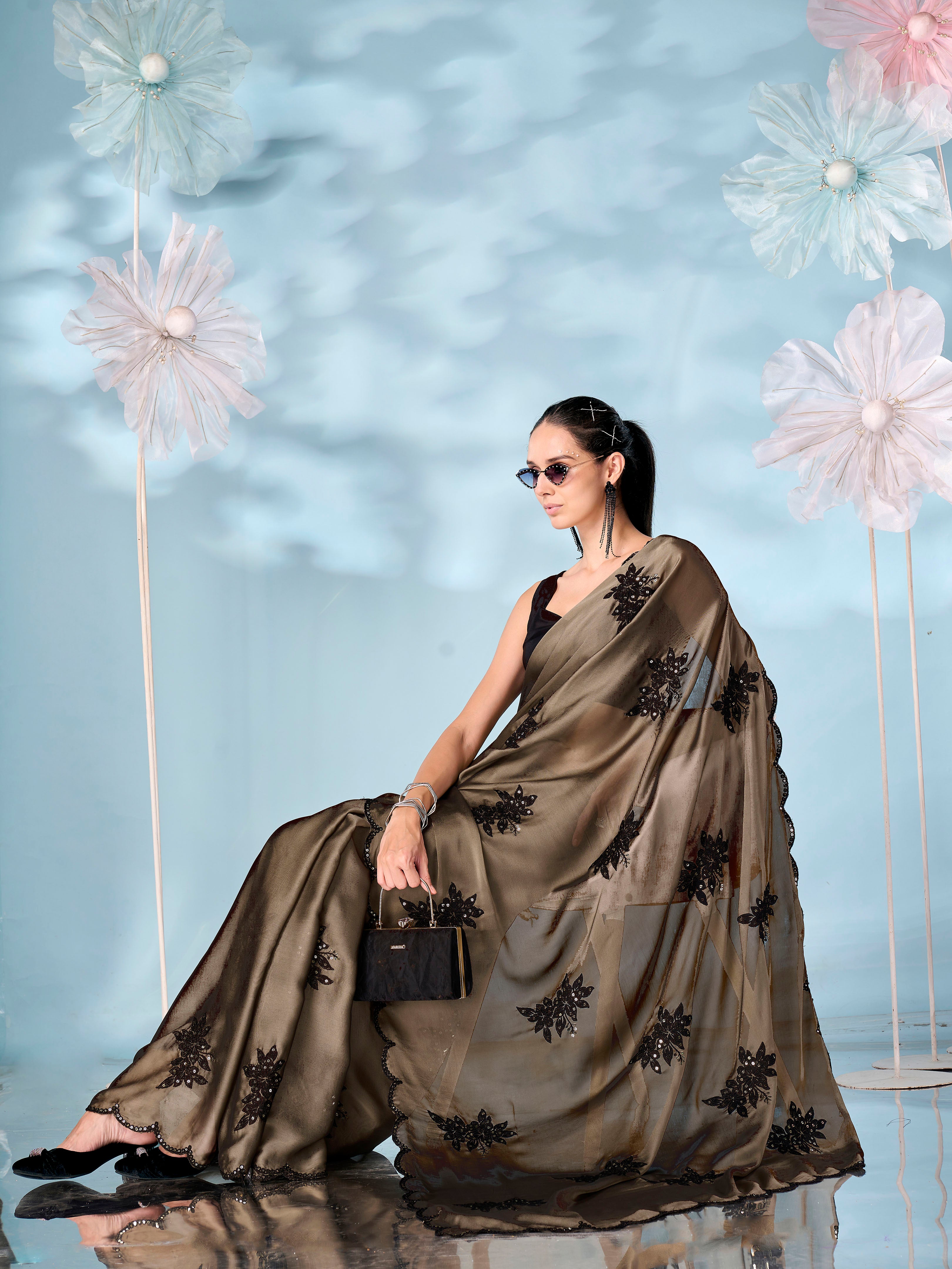 Olive colored sequinned emboidered saree with scalloped border