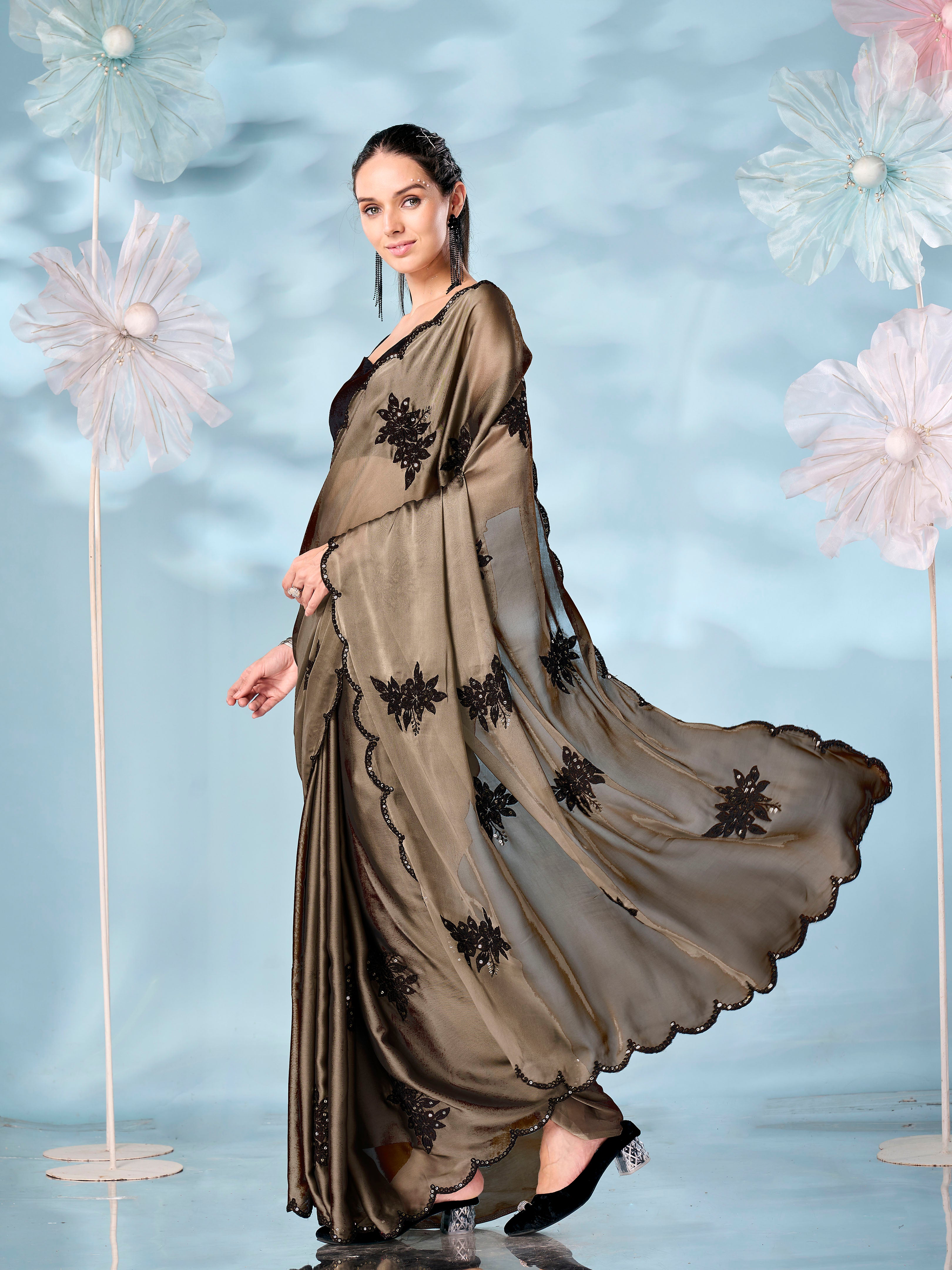 Olive colored sequinned emboidered saree with scalloped border