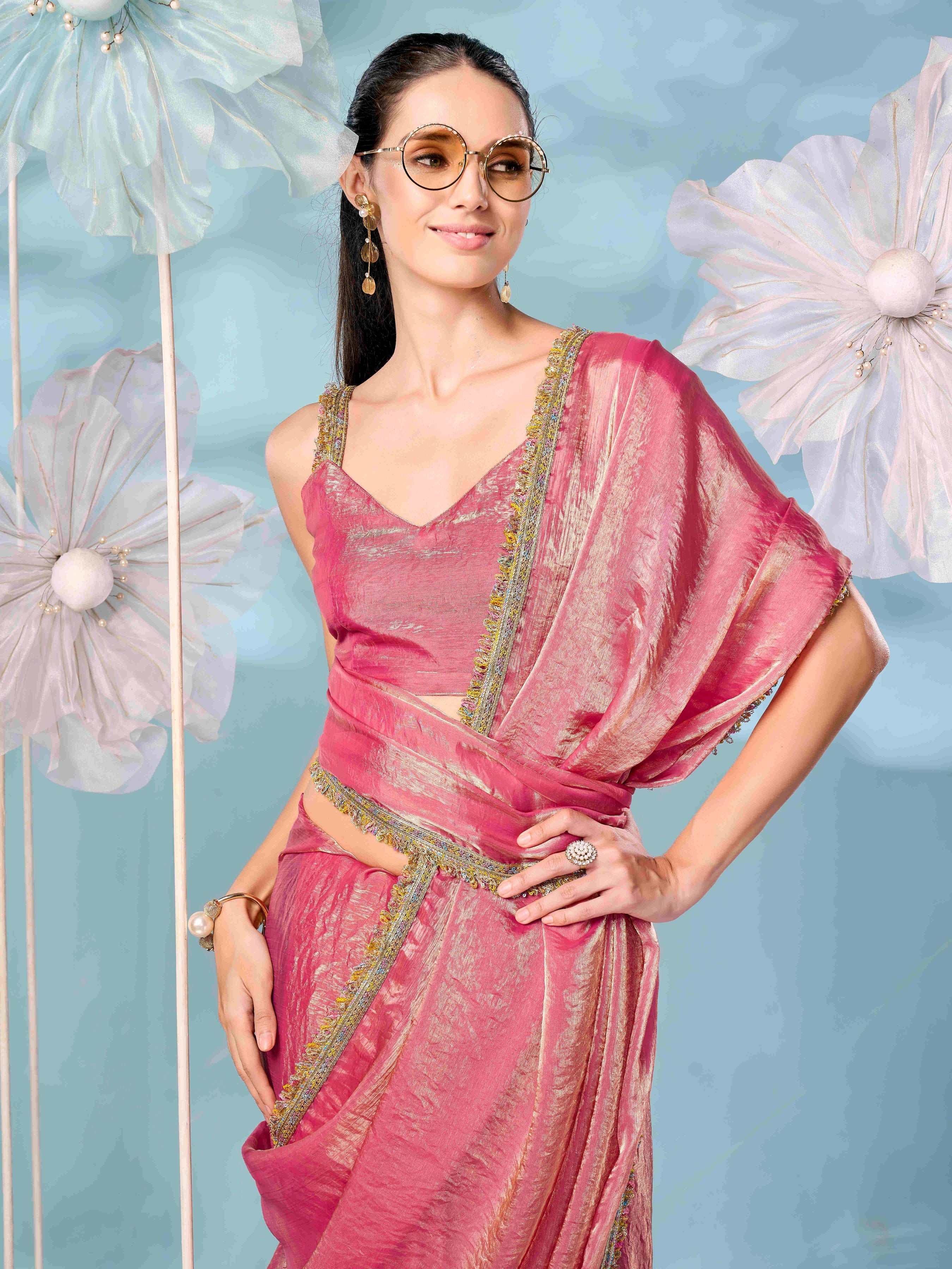 Pink and gold colored two tone jimmy choo saree with multicolor embellished lace border.