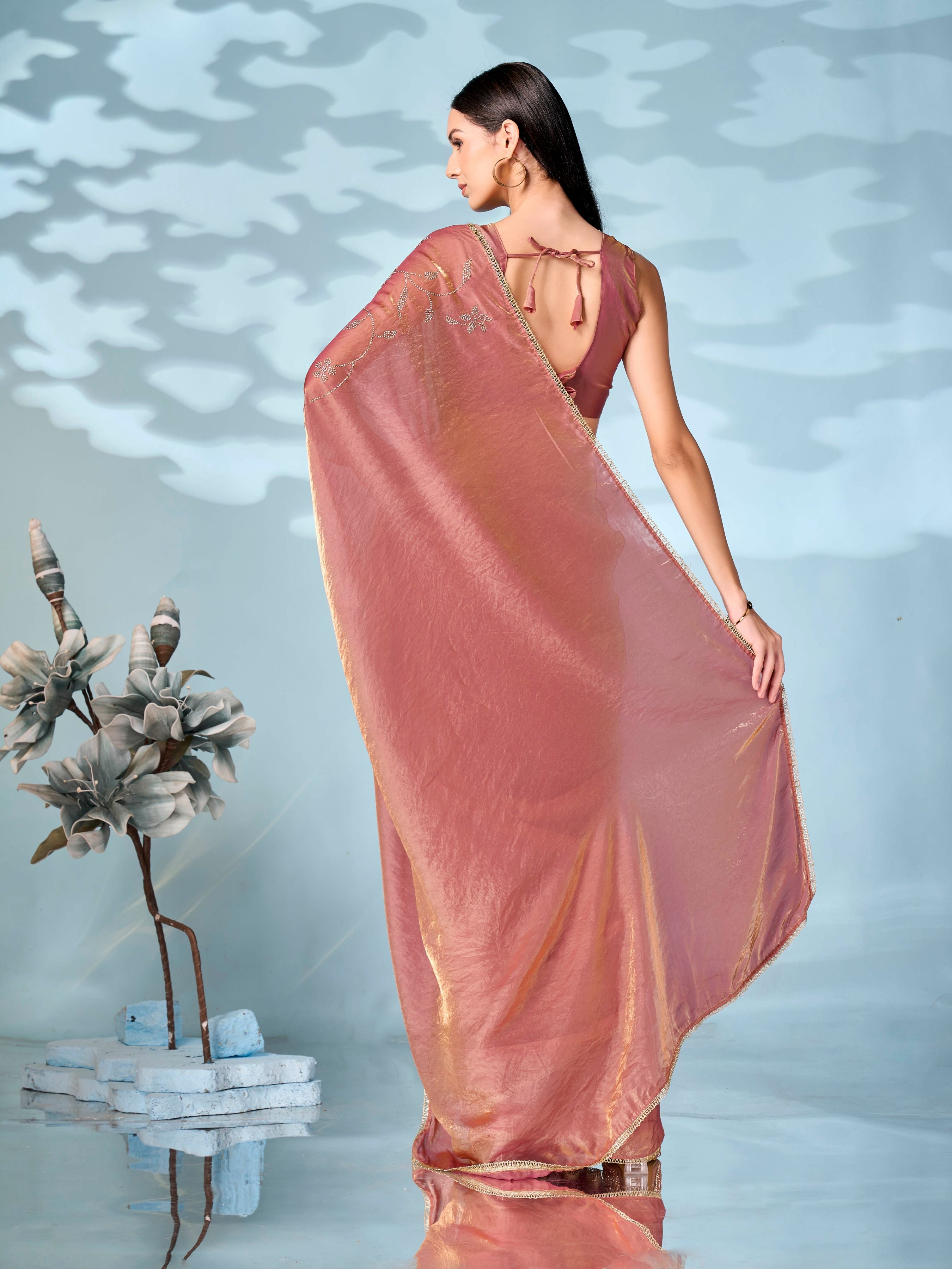 Pink colored two tone designer saree with swaroski work on shoulder portion and embellished lace
