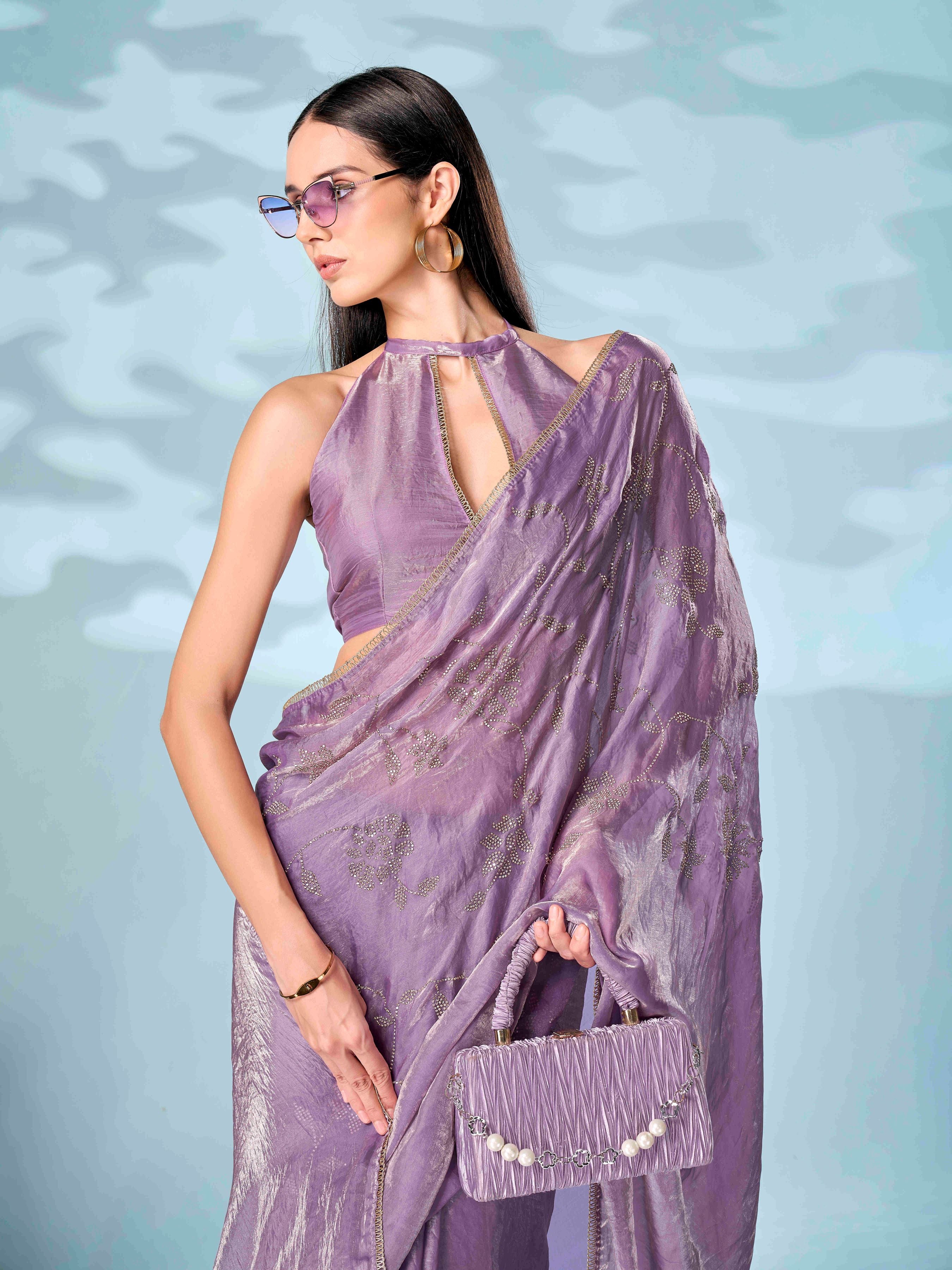 Lavender colored two tone designer saree with swaroski work on shoulder portion and embellished lace
