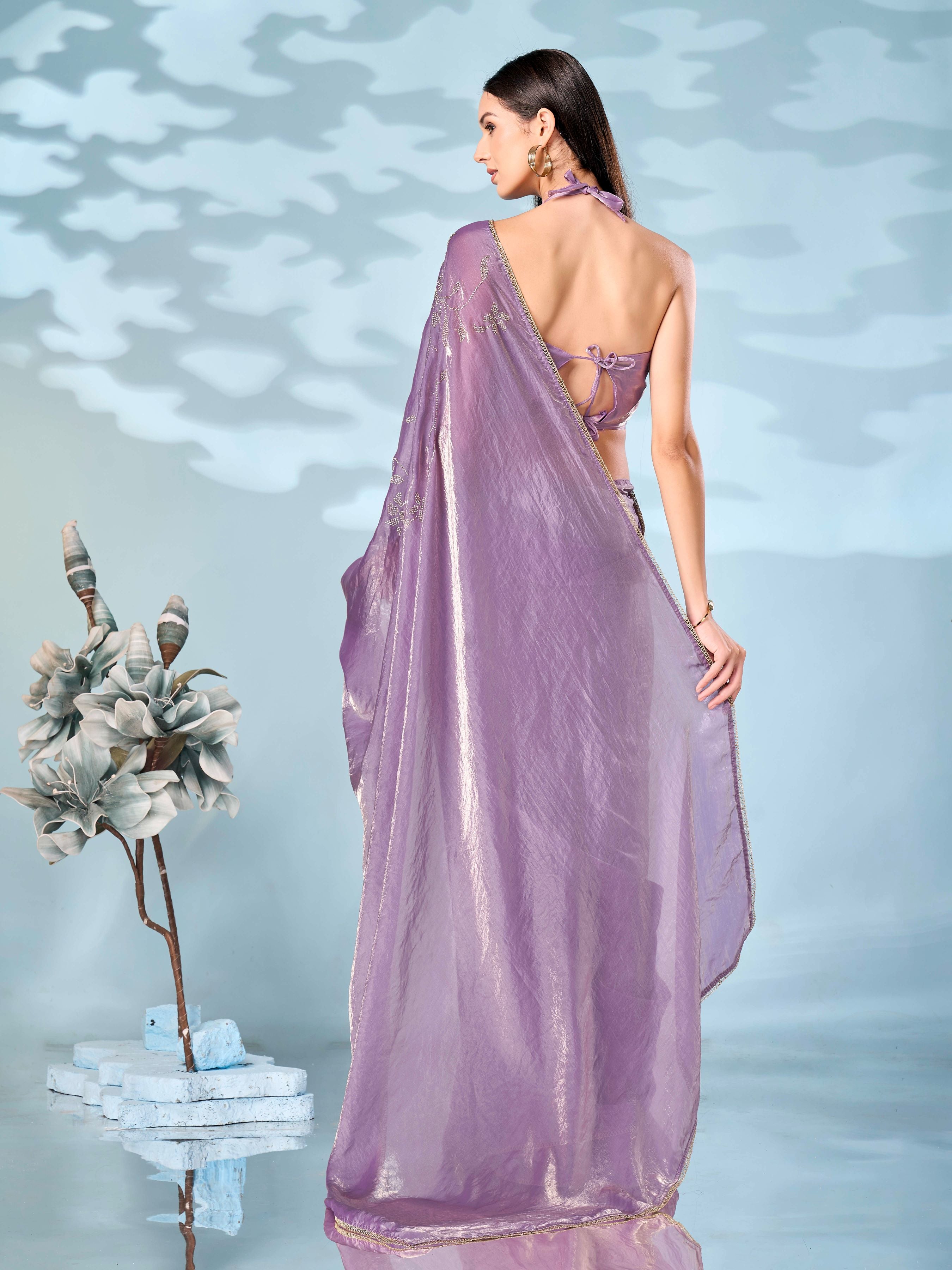 Lavender colored two tone designer saree with swaroski work on shoulder portion and embellished lace