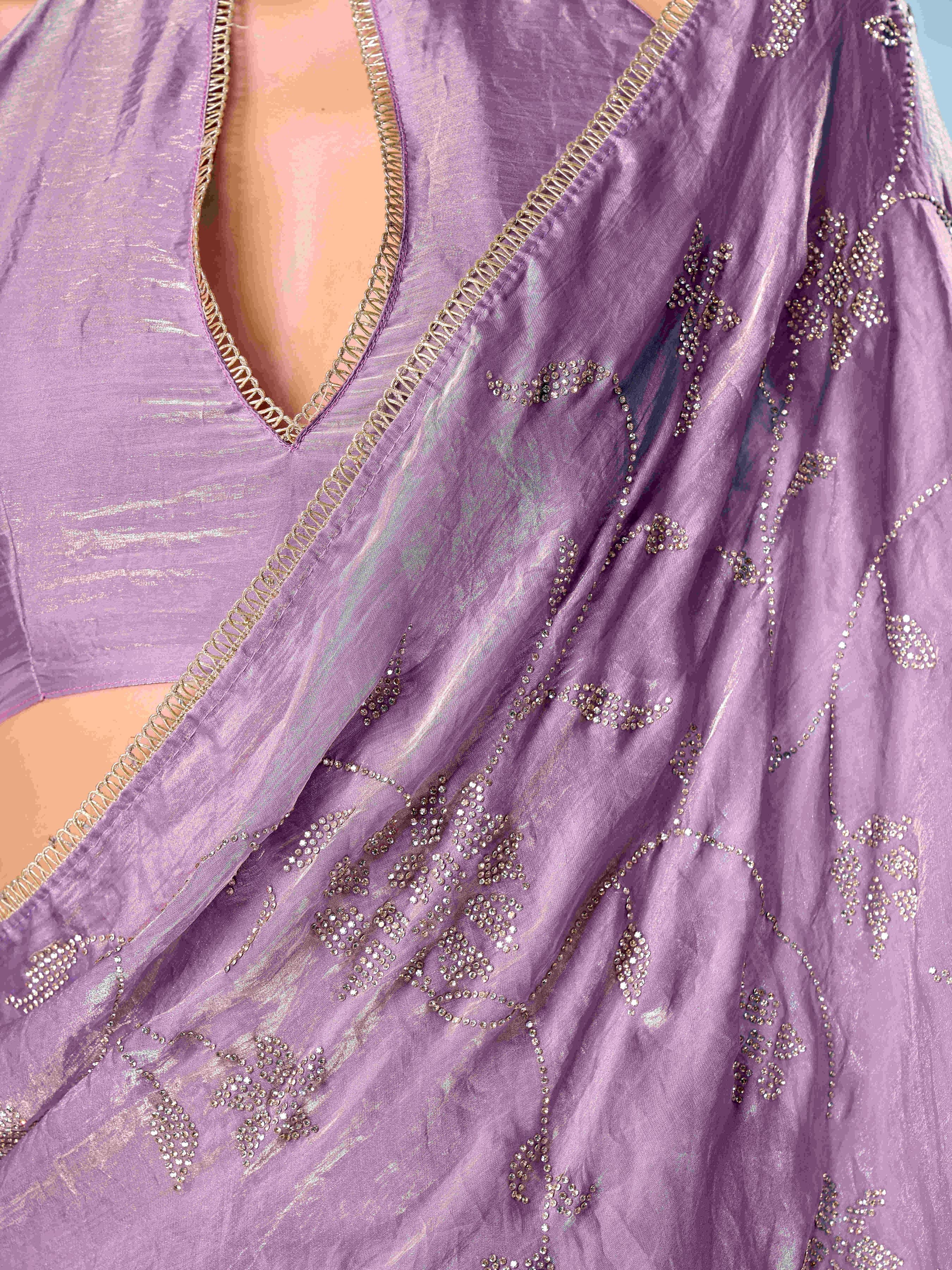 Lavender colored two tone designer saree with swaroski work on shoulder portion and embellished lace