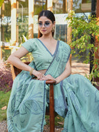 Blue colored muga cotton saree with tassles on pallu