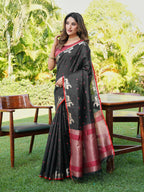 Black and red colored raw silk saree with tassles on pallu