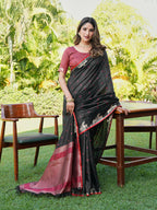 Black and red colored raw silk saree with tassles on pallu