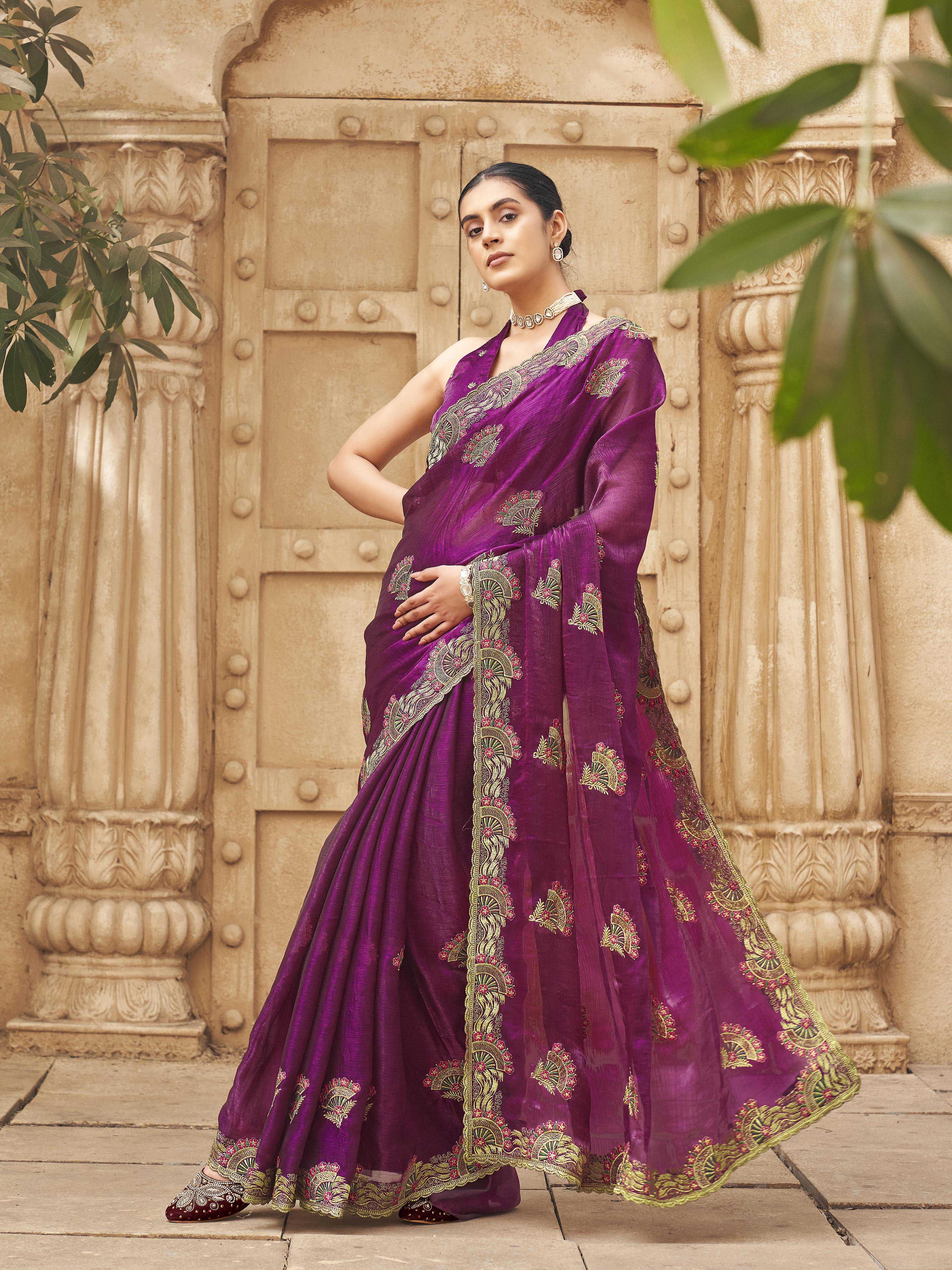 Rust colored designer sequin ebroidered saree