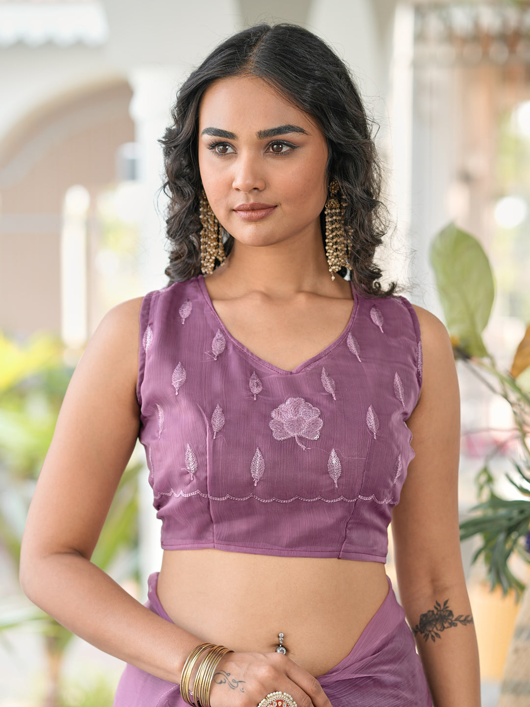 Mauve colored sequin embroidered saree