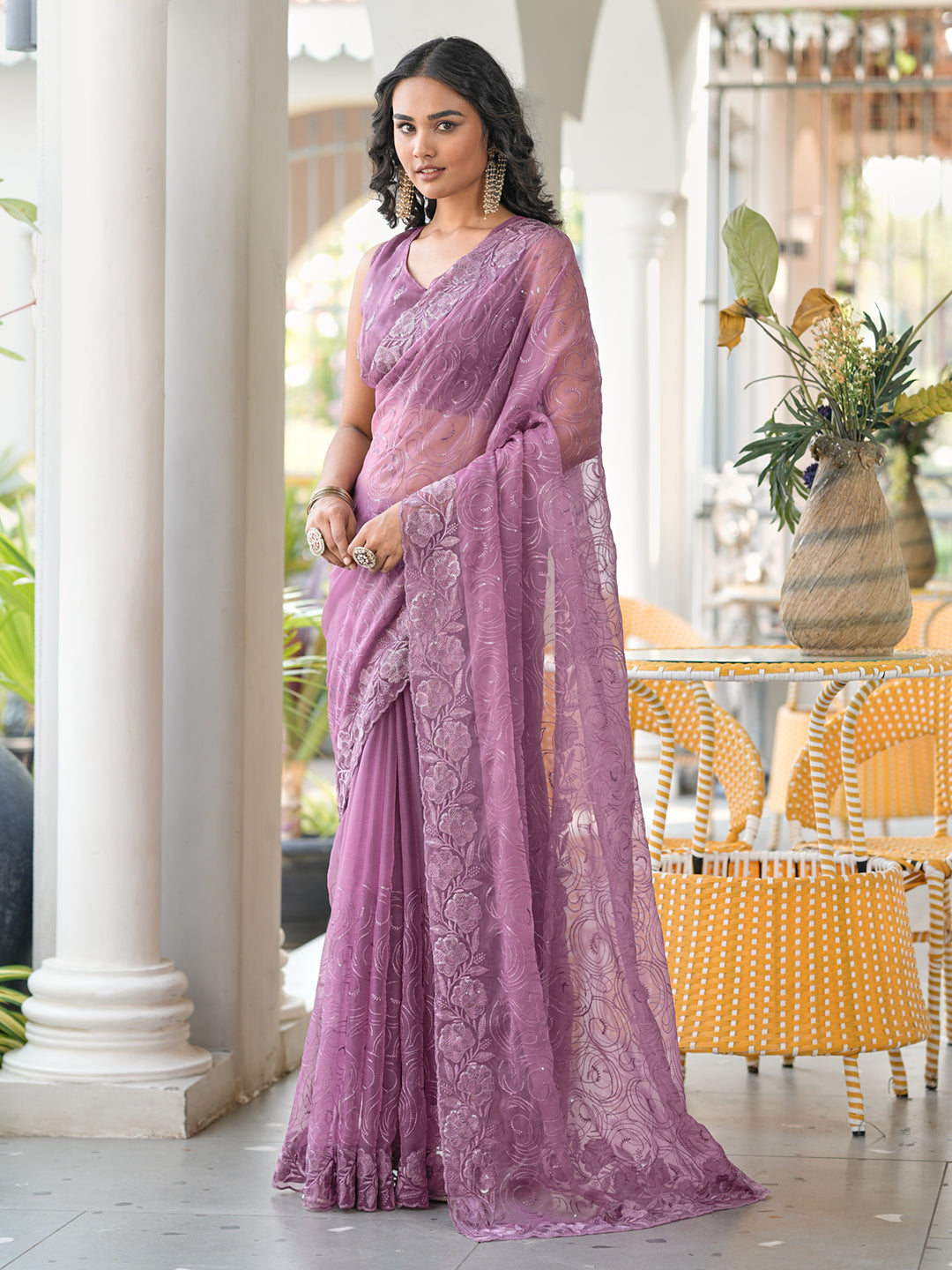 Mauve colored sequin embroidered saree