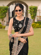 Black colored shimmer georgette base embroidered saree