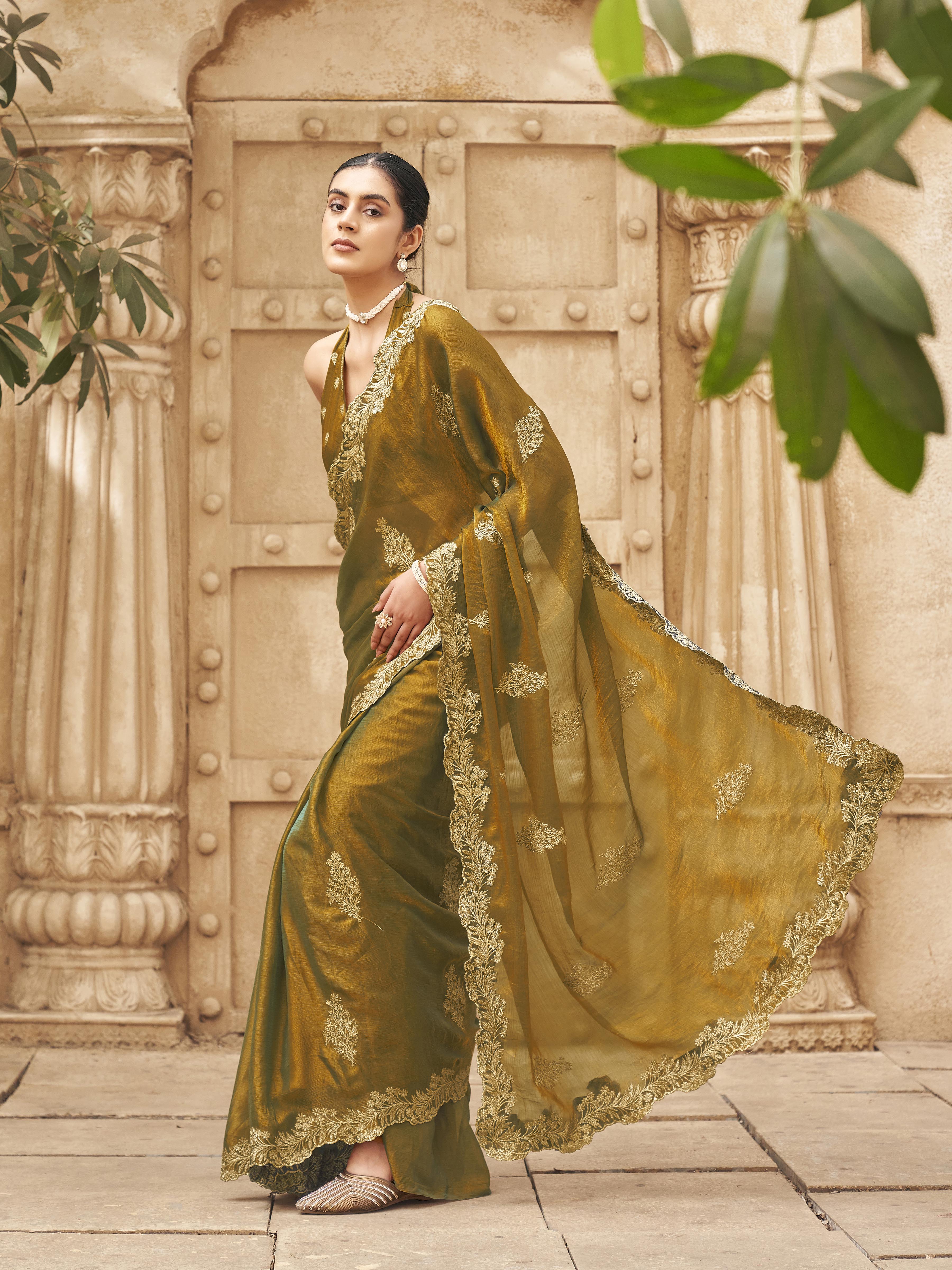 Two tone green and gold colored embroidered saree