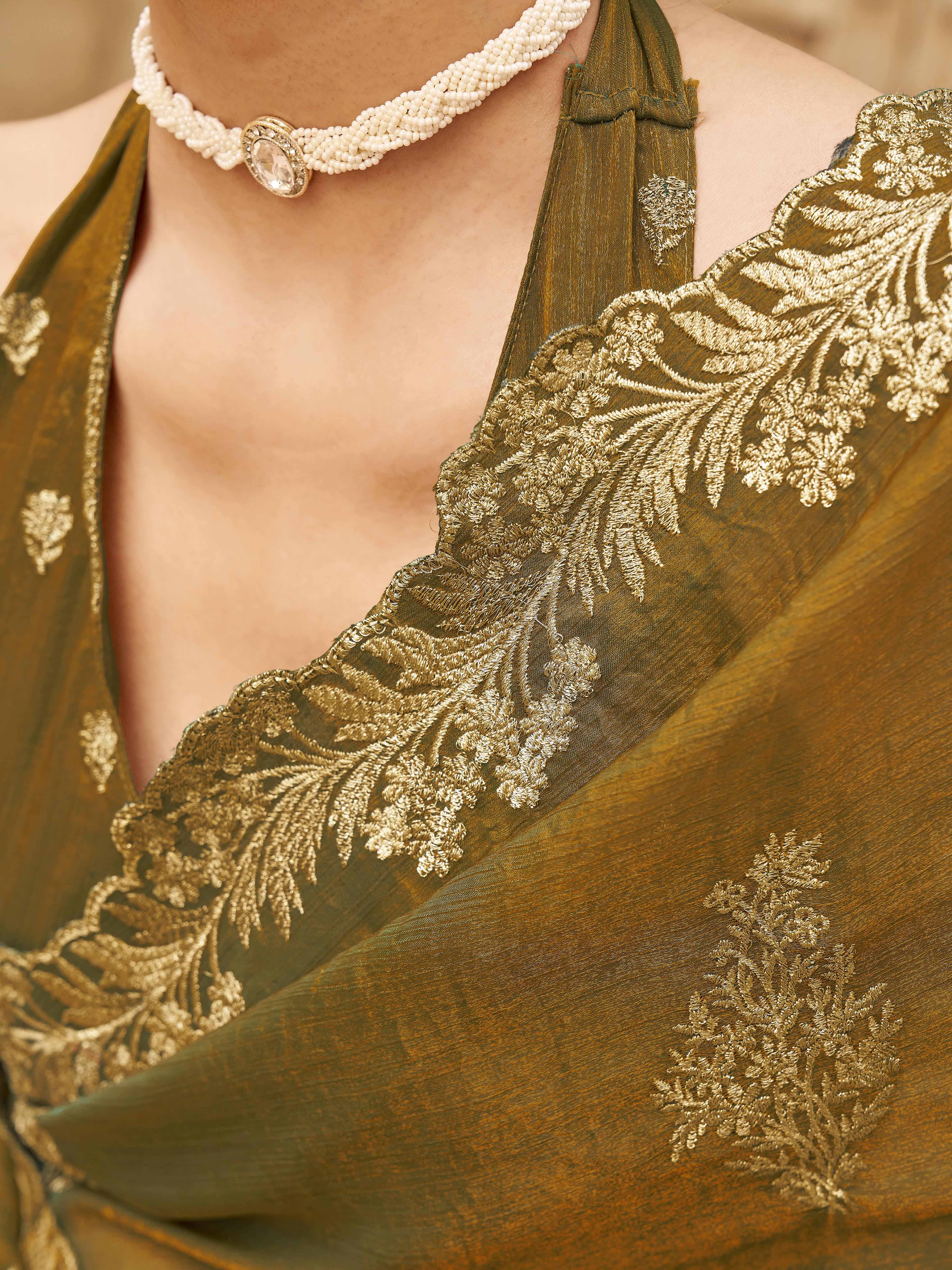 Two tone green and gold colored embroidered saree