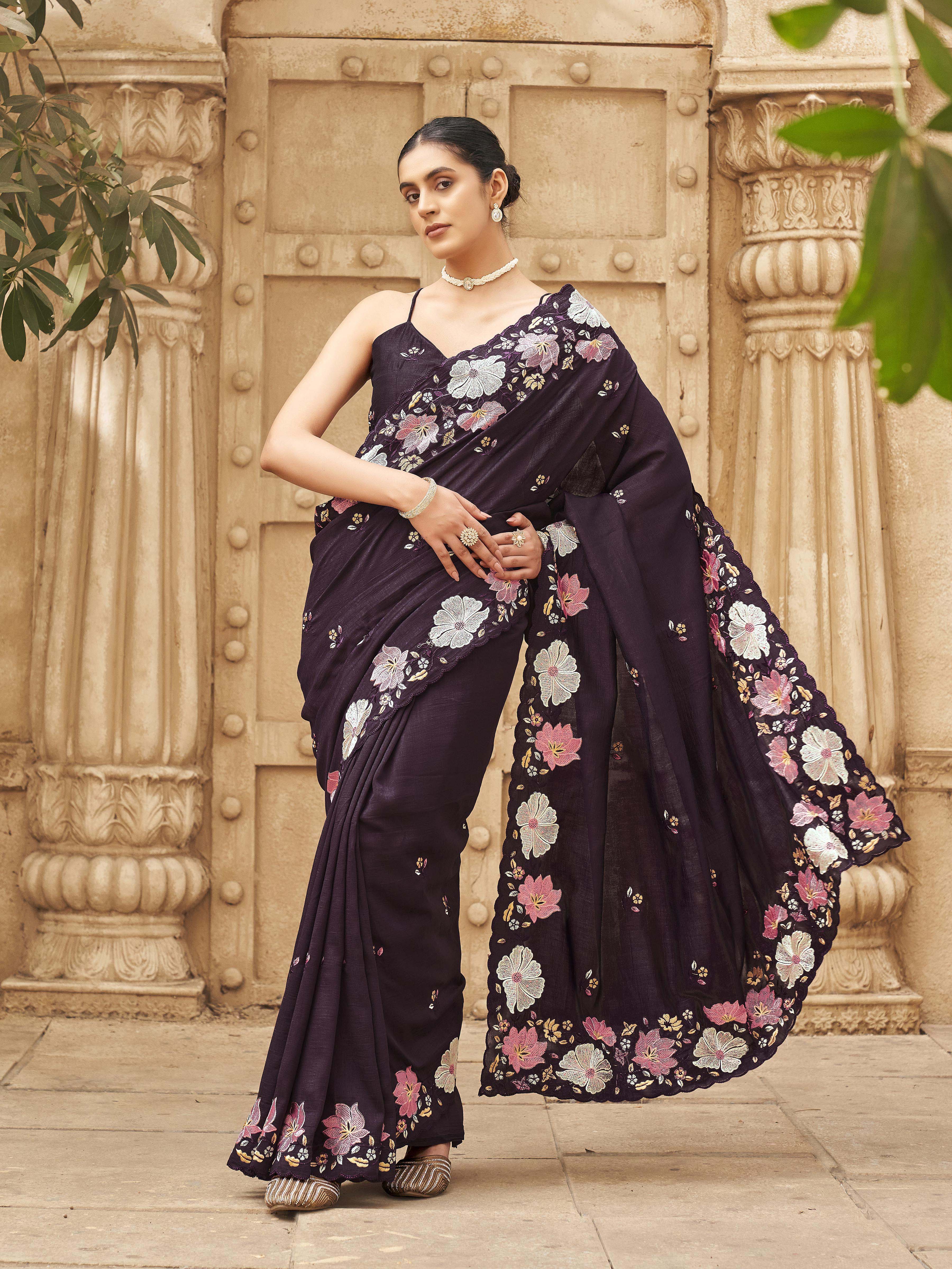 Purple colored shimmer georgette base designer saree