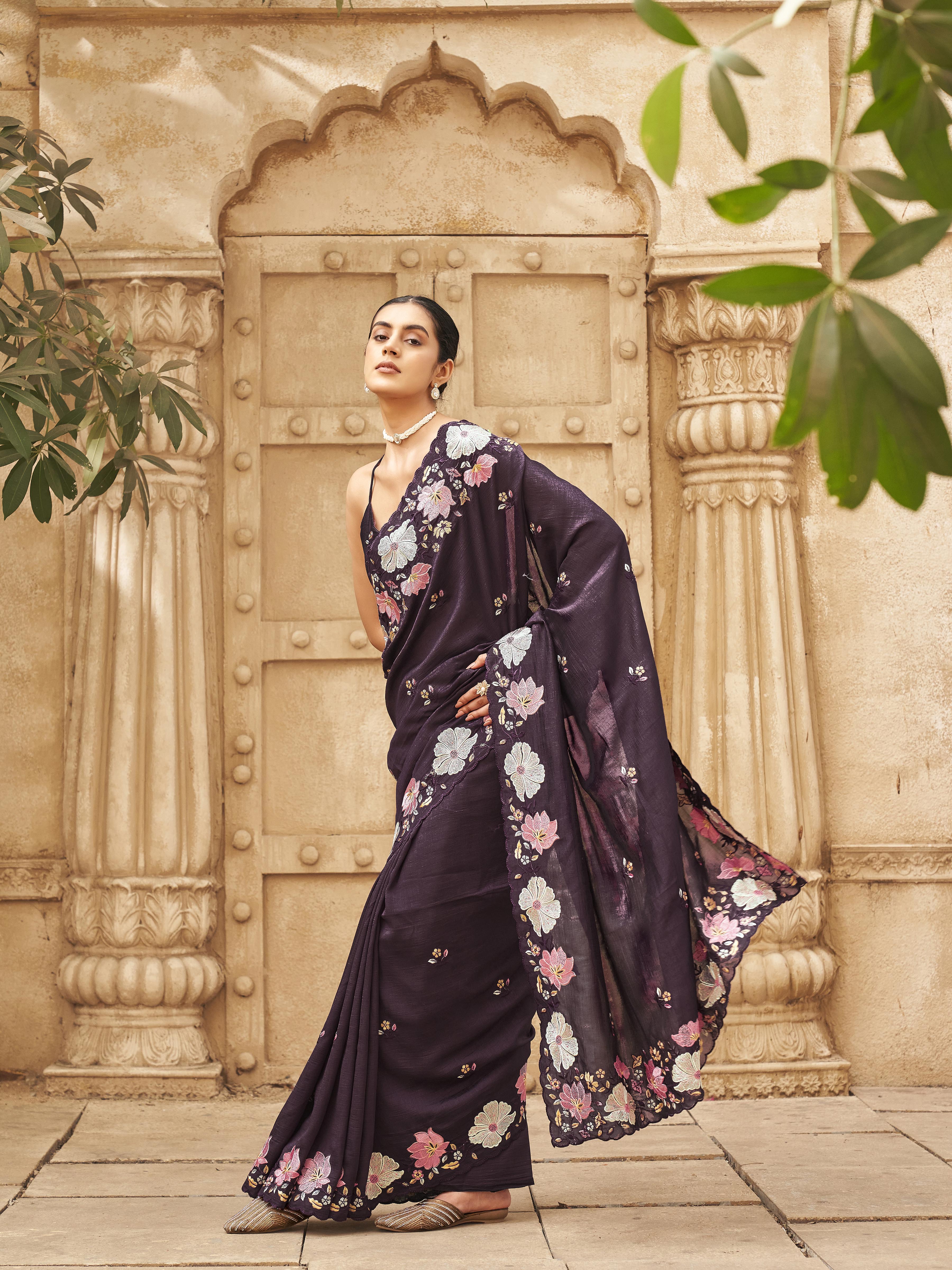 Purple colored shimmer georgette base designer saree